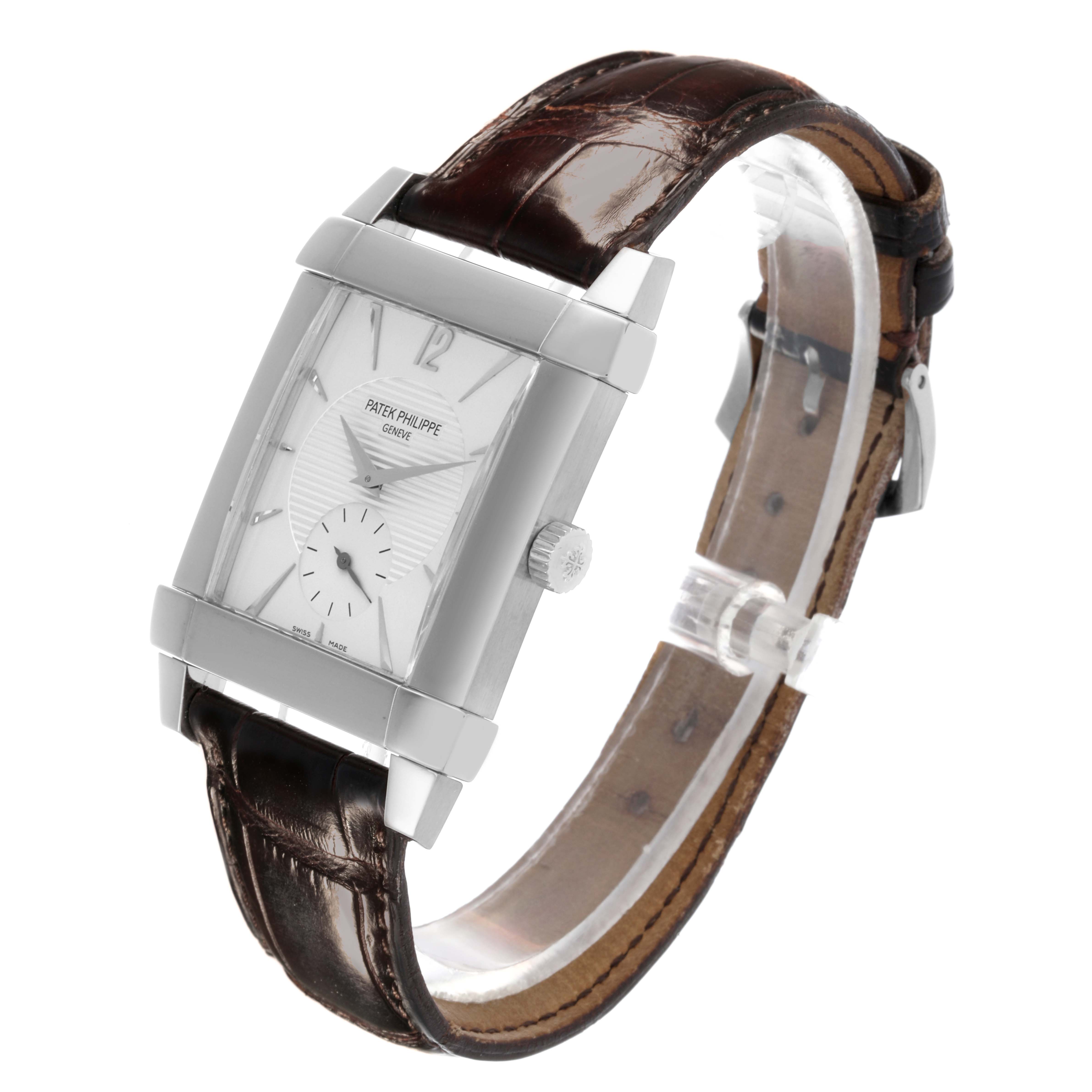 The Patek Philippe Gondolo 5111G-001 Men's White Gold Silver Dial 5111G-001 Men's White Gold Silver Dial watch is shown at a slight side angle, displaying the dial, case, crown, and leather strap.