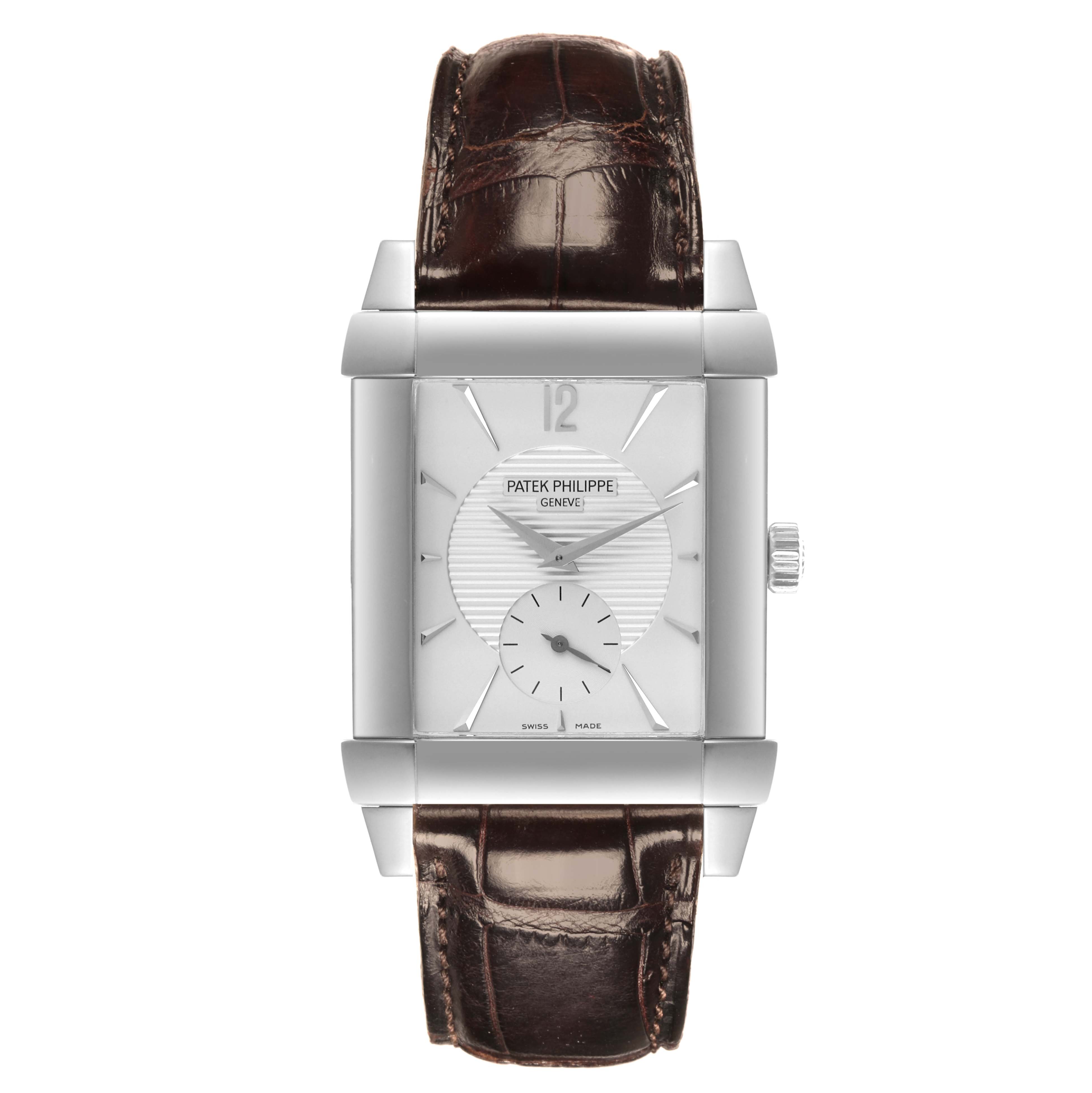 The Patek Philippe Gondolo 5111G-001 Men's White Gold Silver Dial 5111G-001 Men's White Gold Silver Dial watch is shown from a frontal angle, displaying the face, case, crown, and strap.