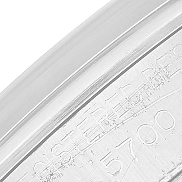 This close-up image shows the edge of the bezel with engraved text on a Rolex Air-King 5700 Men's Stainless Steel Silver Dial 5700 Men's Stainless Steel Silver Dial watch.