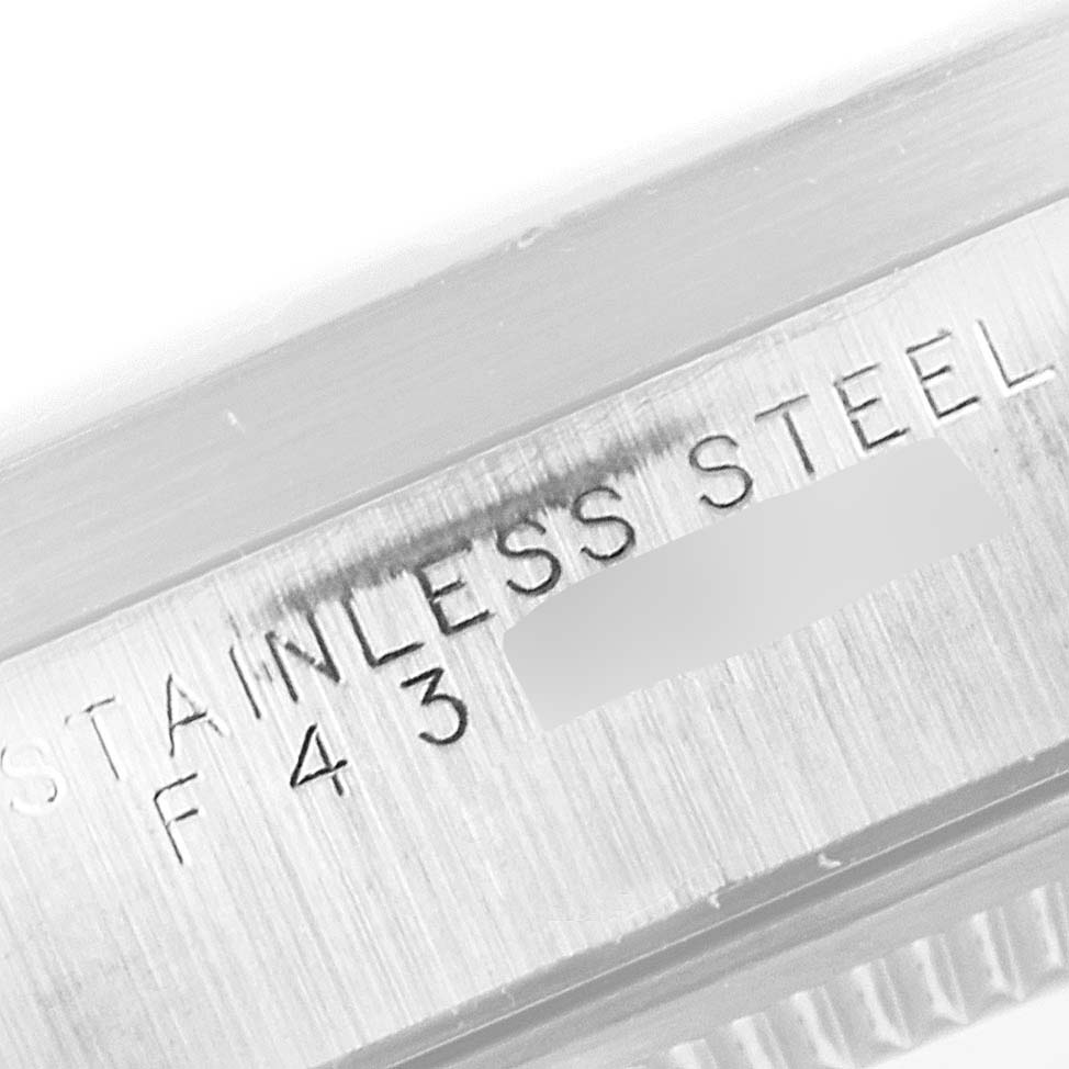 The image shows a close-up of the stainless steel case inscription on the Rolex Air-King 14010 Men's Stainless Steel Silver Dial 14010 Men's Stainless Steel Silver Dial watch.