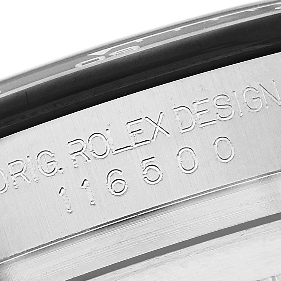 This close-up image shows the engraved model number "116500" on the case of a Rolex Daytona 116500 Men's Stainless Steel Black Dial 116500 Men's Stainless Steel Black Dial watch.