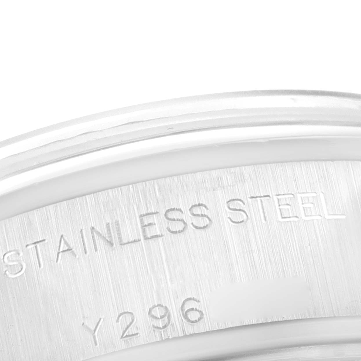 The image shows a close-up of the back casing of a stainless steel Rolex Date 79160 Women's Stainless Steel Pink Dial 79160 Women's Stainless Steel Pink Dial model watch.