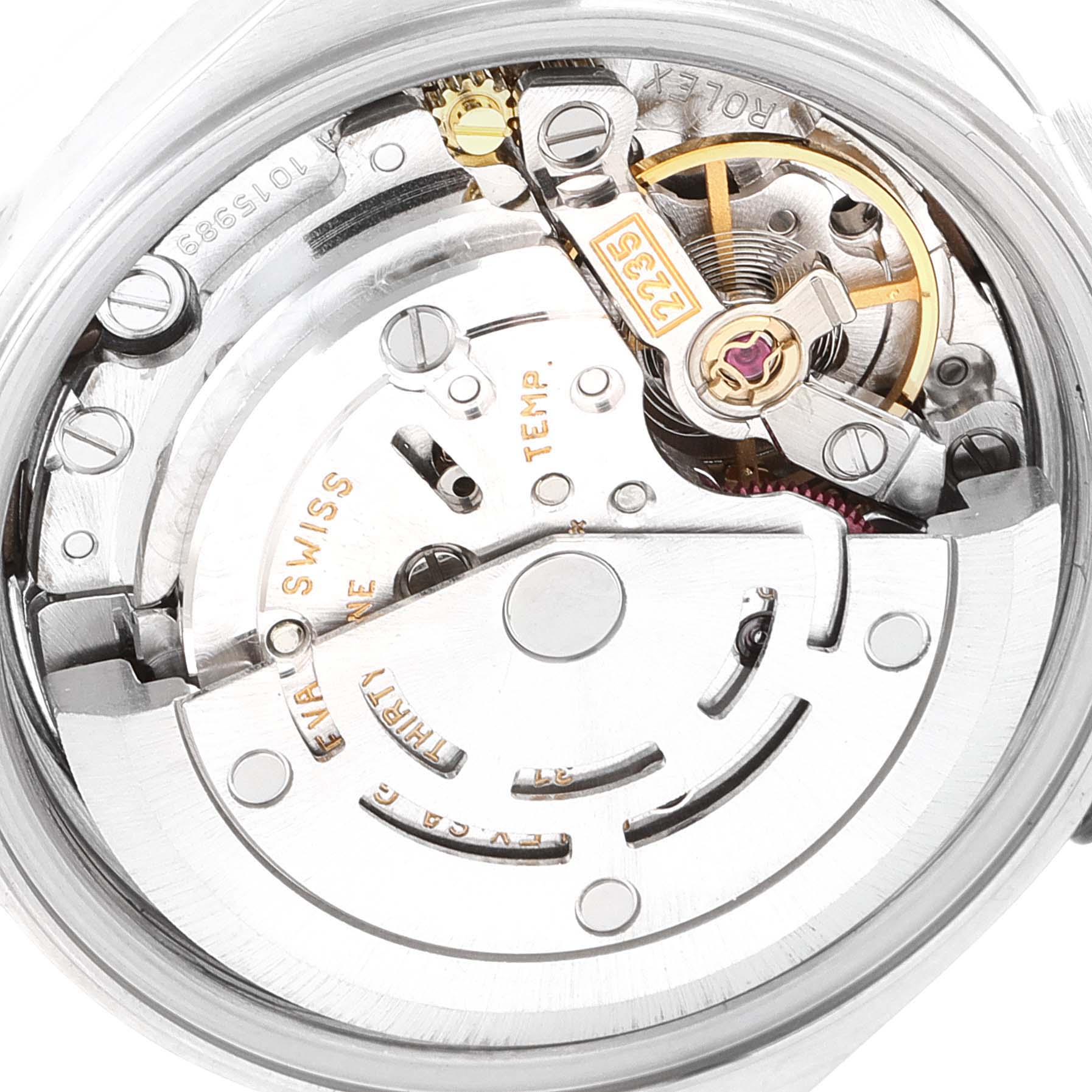 The image shows a close-up of the Rolex Date 79160 Women's Stainless Steel Pink Dial 79160 Women's Stainless Steel Pink Dial model's movement mechanism, highlighting gears and internal components.