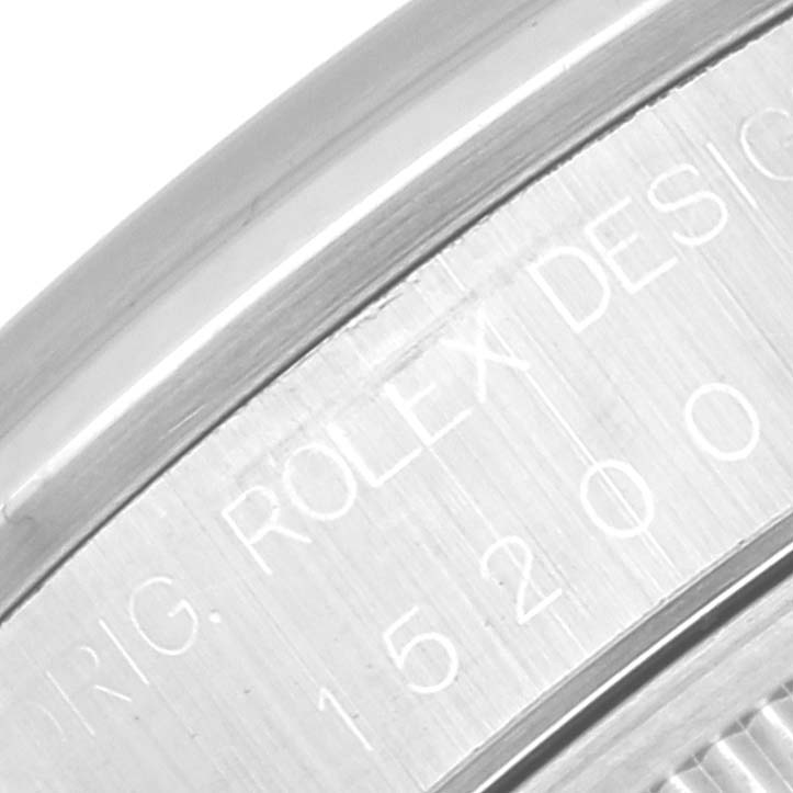 The image shows a close-up of the engraved model number and brand name on the case side of a Rolex Date 15200 Men's Stainless Steel Blue Dial 15200 Men's Stainless Steel Blue Dial watch.