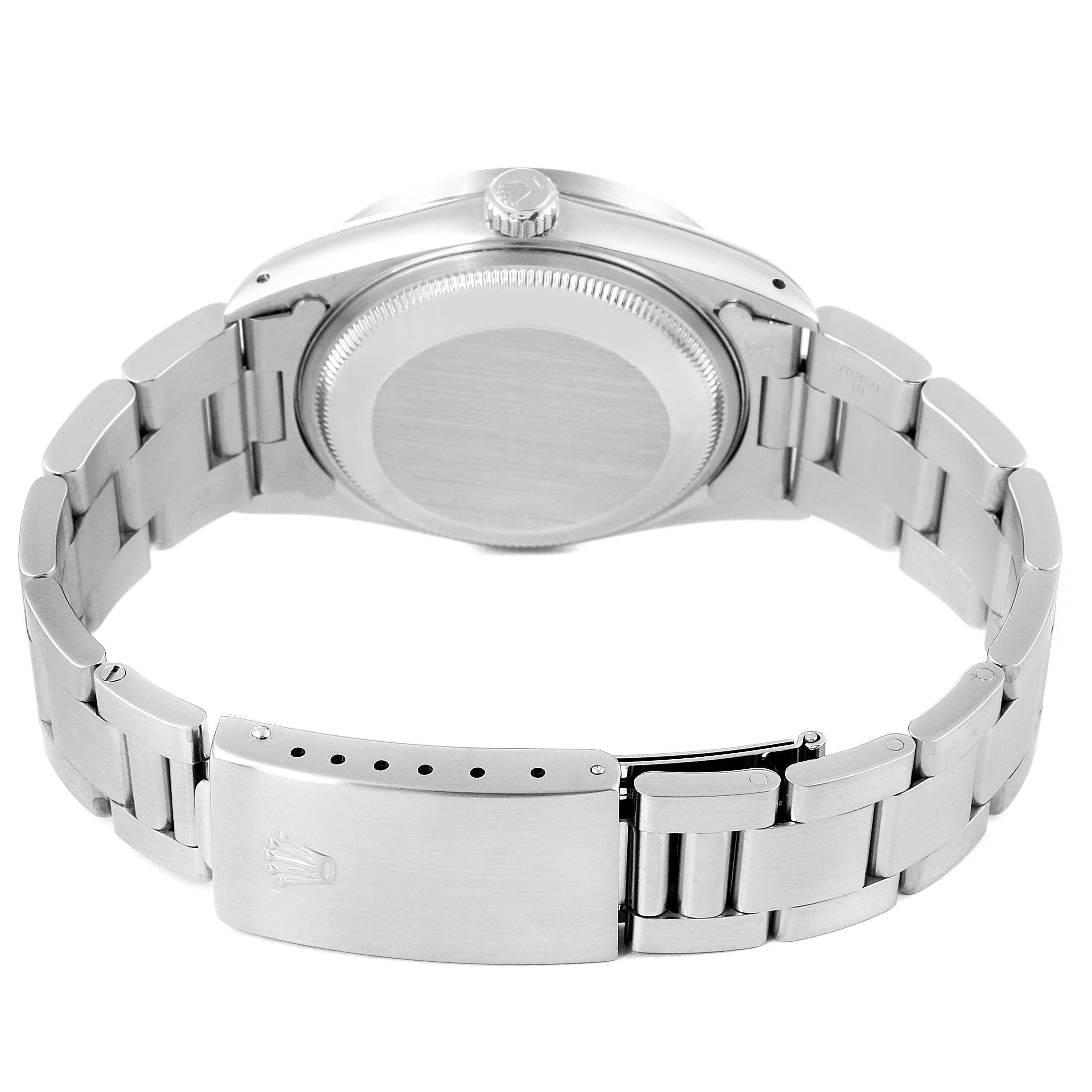 The image shows the back case, crown, and bracelet of the Rolex Date 15210 Men's Stainless Steel Silver Dial 15210 Men's Stainless Steel Silver Dial model watch.