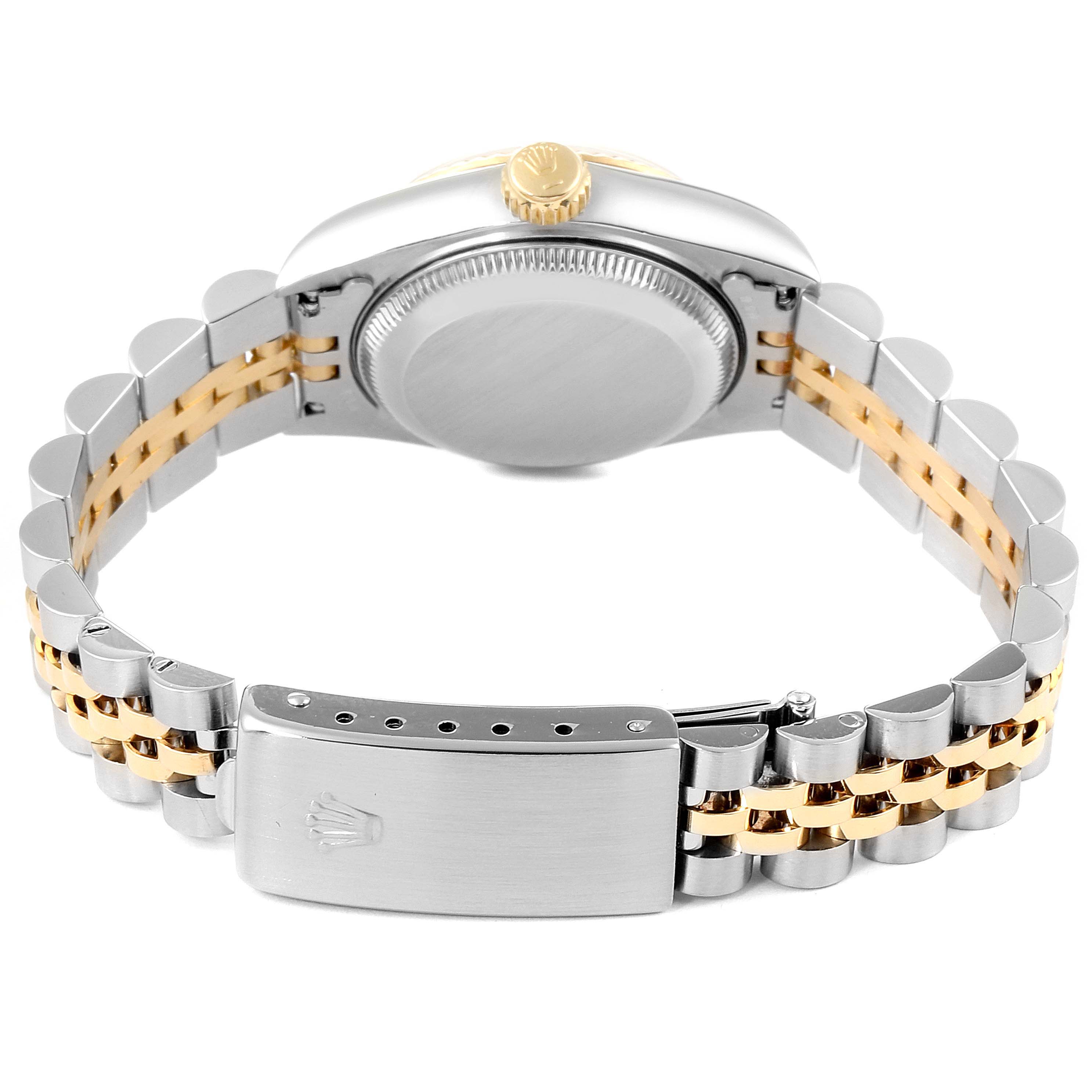The image shows the back of the Rolex Datejust 69173 Women
s Steel and Gold (two tone) Champagne Dial 69173 Women
s Steel and Gold (two tone) Champagne Dial watch, displaying the case back and the jubilee bracelet with a clasp.