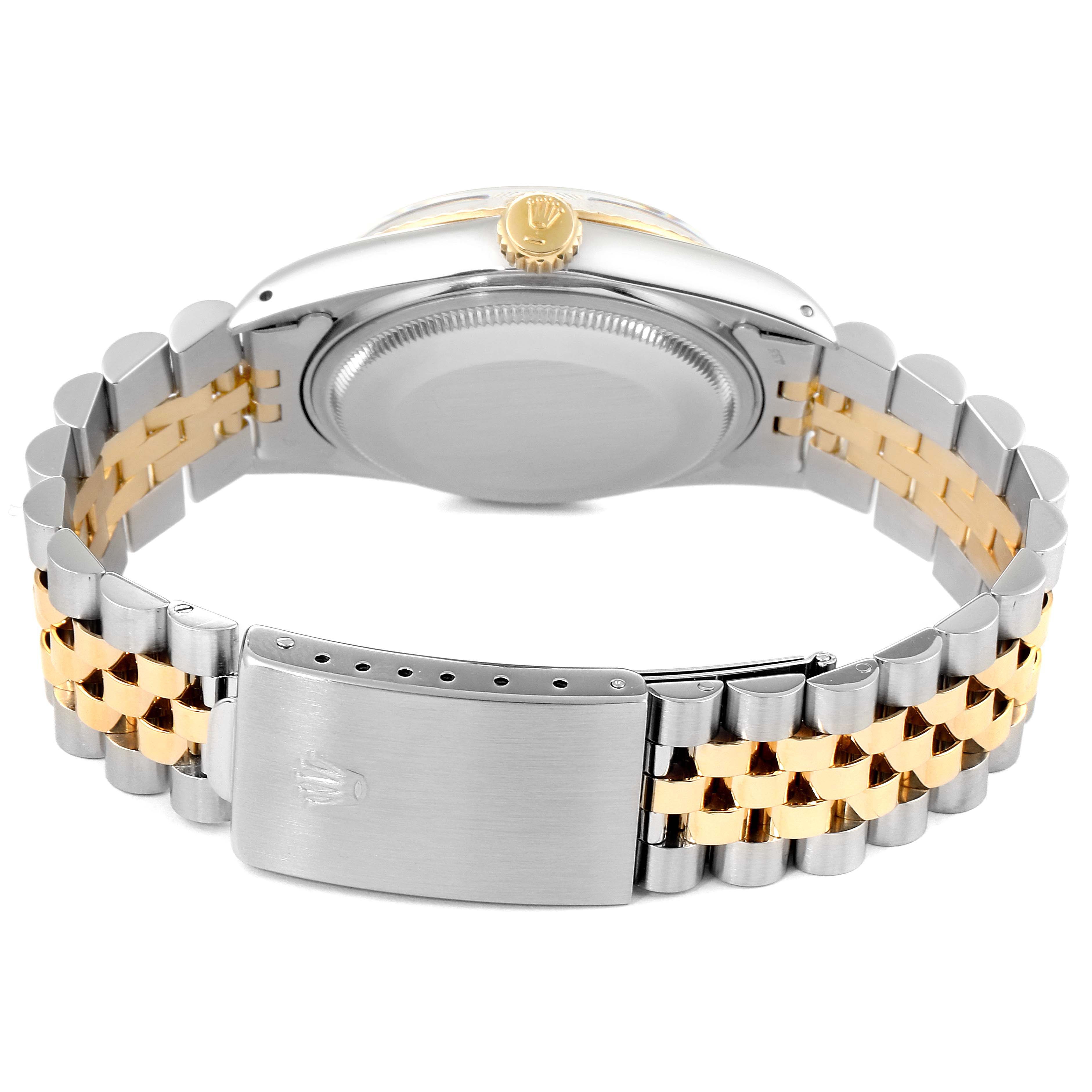 This image shows the back view of a Rolex Datejust 16013 Men's Steel and Gold (two tone) Champagne Dial 16013 Men's Steel and Gold (two tone) Champagne Dial watch, highlighting the case back, crown, and two-tone jubilee bracelet with clasp.