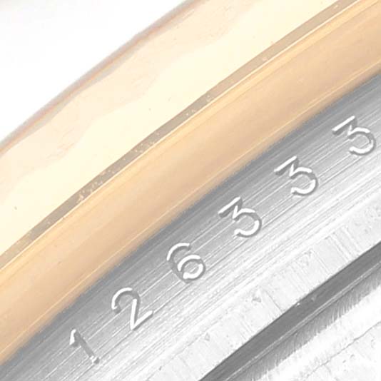 The image shows a close-up of the bezel and date markers of a Rolex Datejust 41 126333 Men's Steel and Gold (two tone) Black Dial 126333 Men's Steel and Gold (two tone) Black Dial watch.