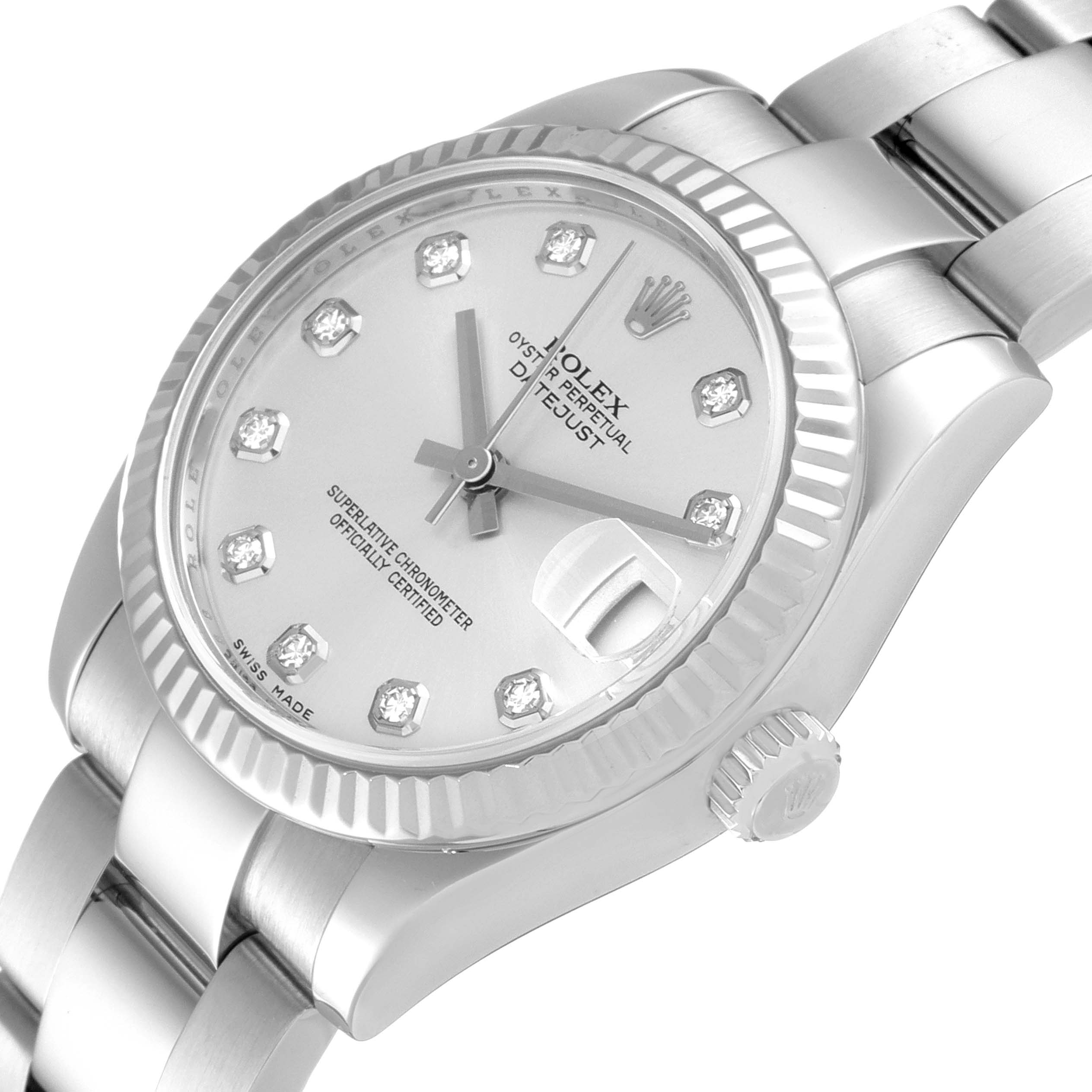 This image shows a Rolex Mid-Size 178274 Women's Stainless Steel Silver Dial 178274 Women's Stainless Steel Silver Dial Datejust watch from an angled top view, highlighting the dial, bezel, crown, and part of the bracelet.