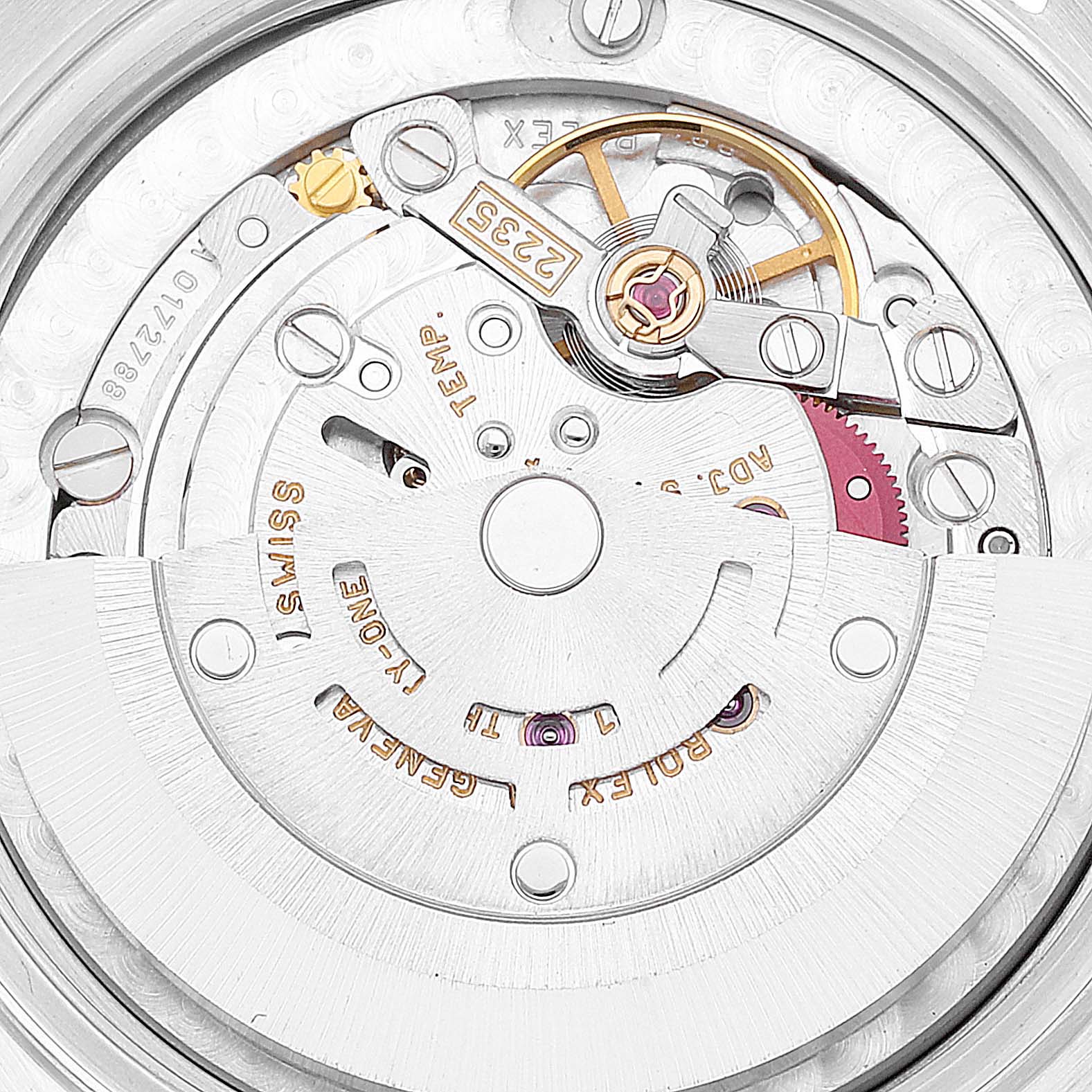 This image shows a close-up view of the intricate inner mechanical movement of the Rolex Mid-Size 78273 Women
s Steel and Gold (two tone) Black Dial 78273 Women
s Steel and Gold (two tone) Black Dial watch model.