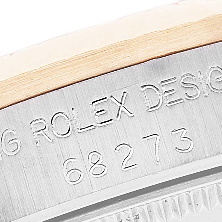 The image shows a close-up view of the case side engraving on a Mid-Size Rolex watch, featuring model number 68273.