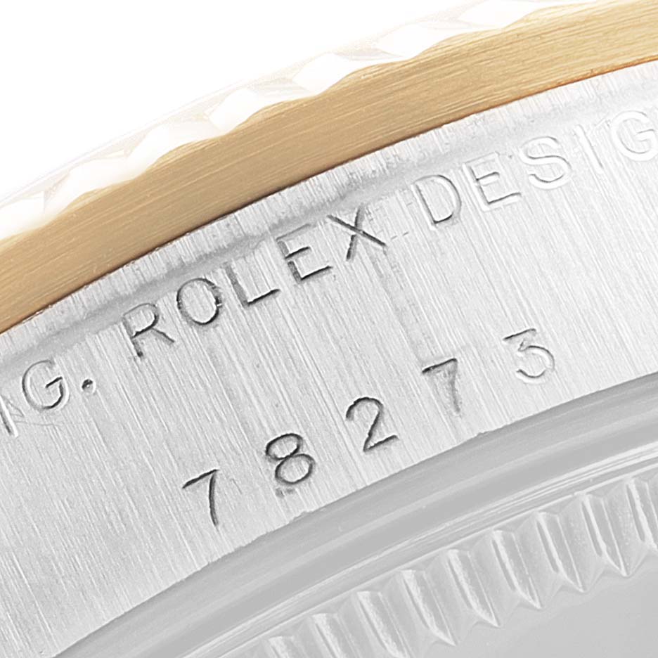 This close-up image shows the engraved case back of a mid-size Rolex watch, including model number 78273.