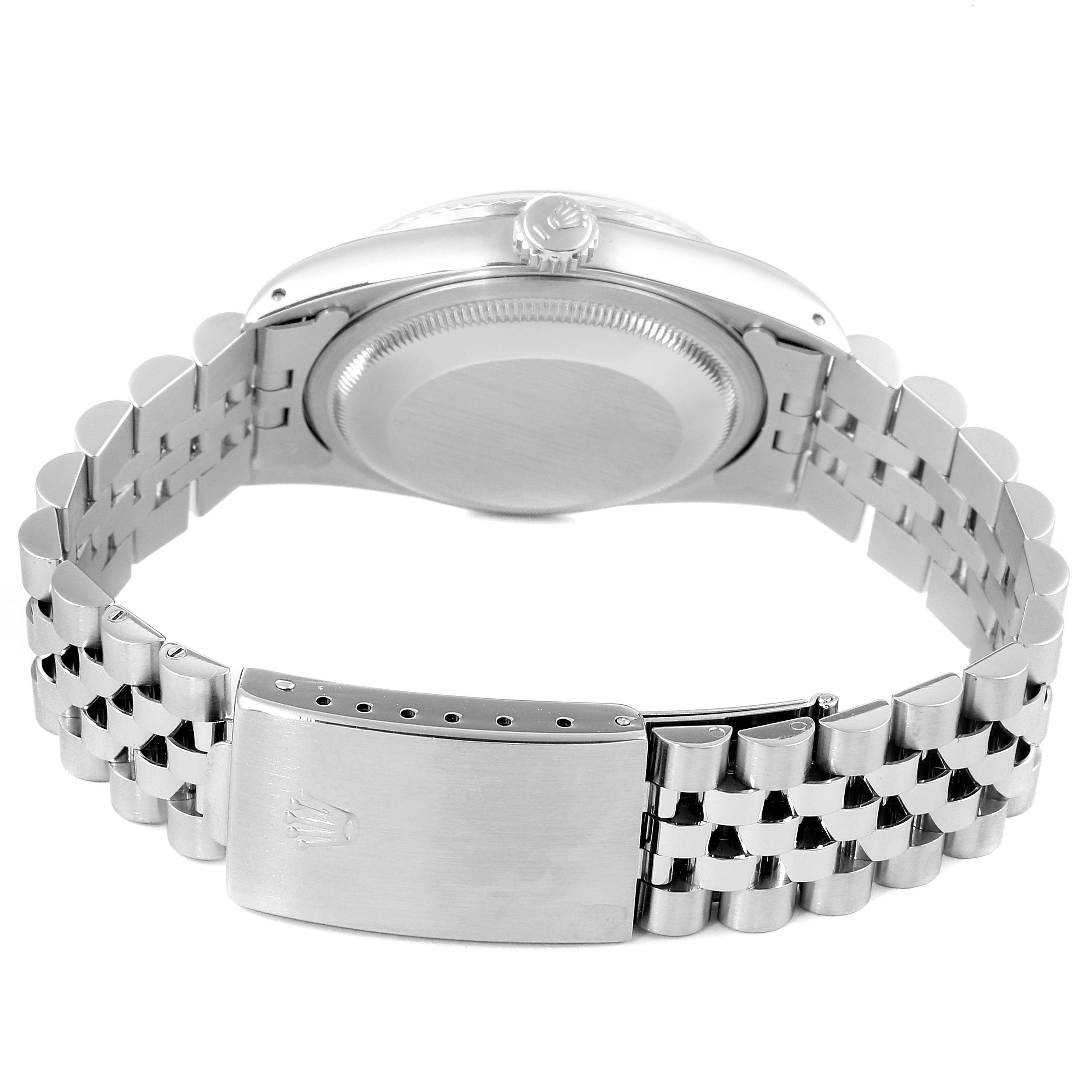 The image shows the back view of a Rolex Datejust 16234 Men's Stainless Steel Silver Dial 16234 Men's Stainless Steel Silver Dial watch, highlighting its case back and Jubilee bracelet with clasp.