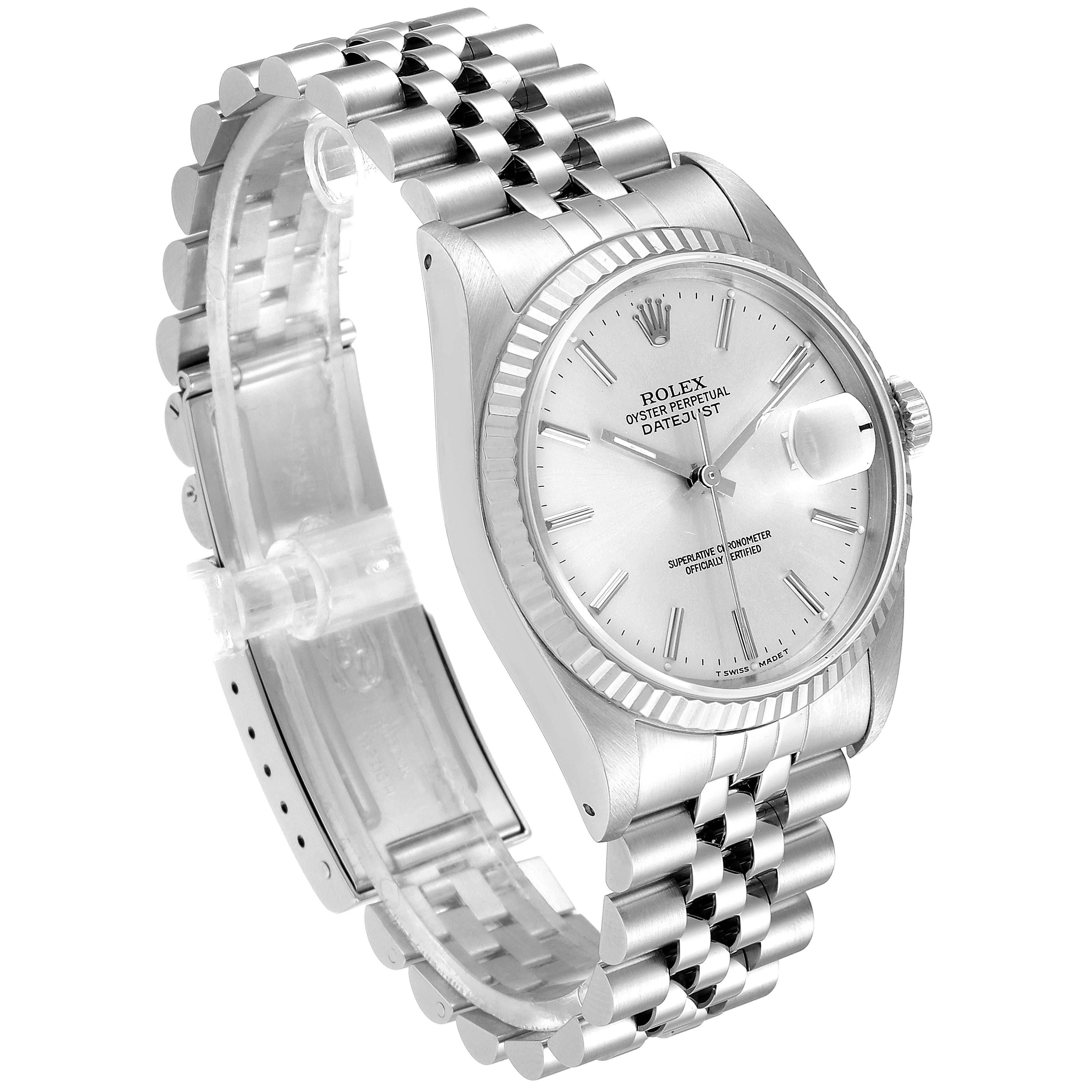 The Rolex Datejust 16234 Men's Stainless Steel Silver Dial 16234 Men's Stainless Steel Silver Dial watch is shown at an angled view, highlighting the dial, fluted bezel, case, and Jubilee bracelet.