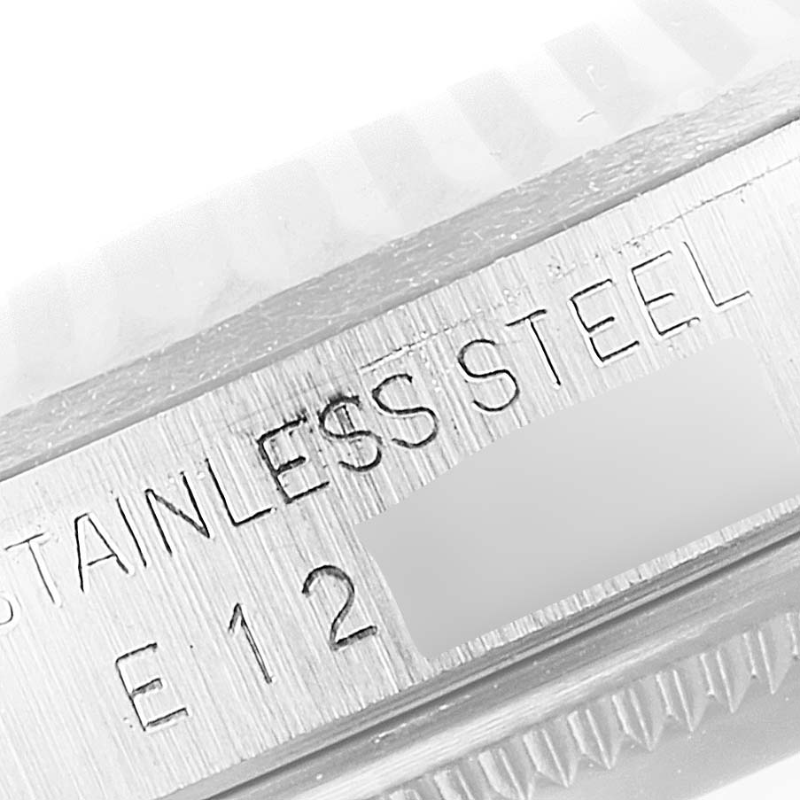 This image shows a close-up of the case side of a Rolex Datejust 16234 Men's Stainless Steel Silver Dial 16234 Men's Stainless Steel Silver Dial watch, revealing the "Stainless Steel" engraving.