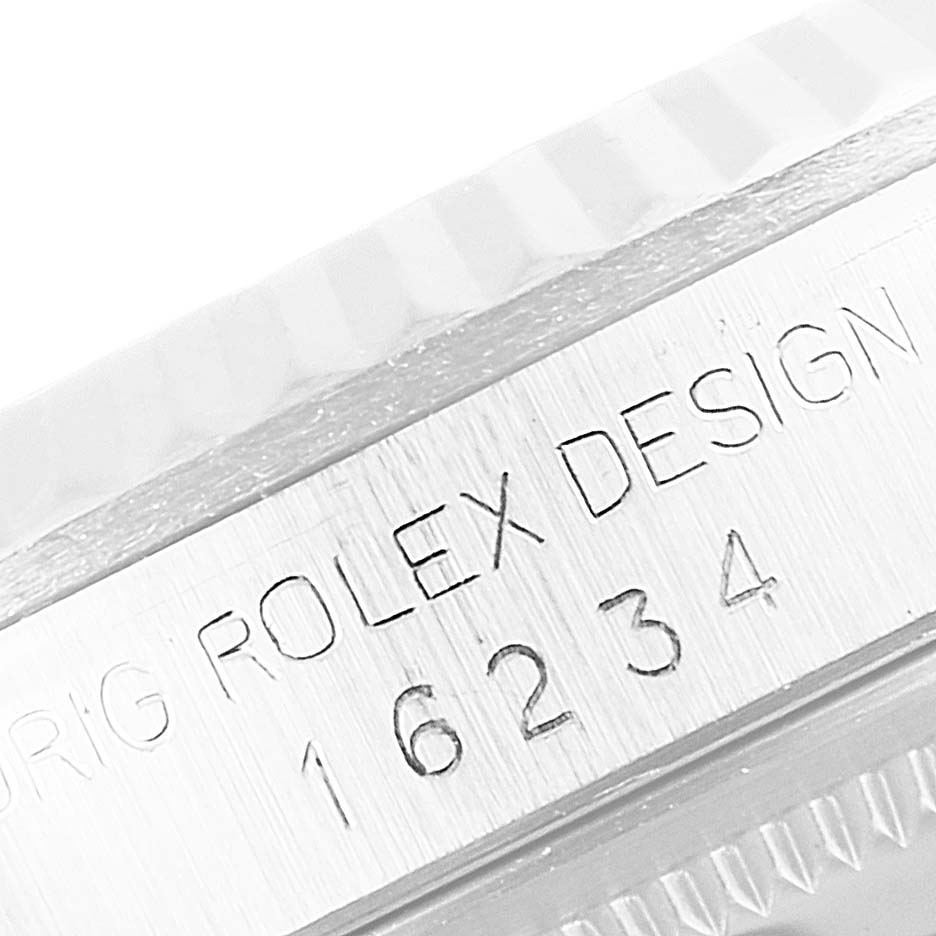 Close-up view of the engraving on the side of the case for a Rolex Datejust 16234 Men's Stainless Steel Silver Dial 16234 Men's Stainless Steel Silver Dial model, showcasing the model number.