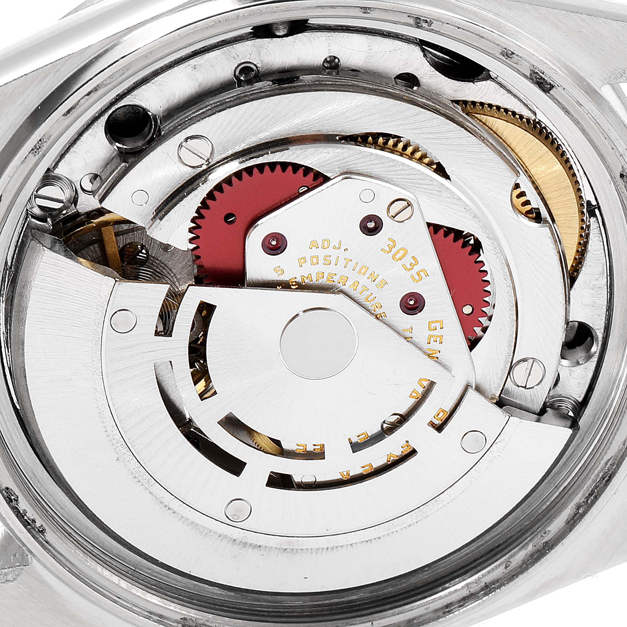 The image shows the internal movement mechanism of a Vintage Collection Rolex watch, viewed from the back.