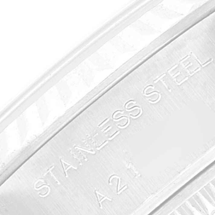 This close-up image shows the "STAINLESS STEEL" engraving on the inside of the Rolex Datejust 79174 Women's Stainless Steel Blue Dial 79174 Women's Stainless Steel Blue Dial model watch bracelet.