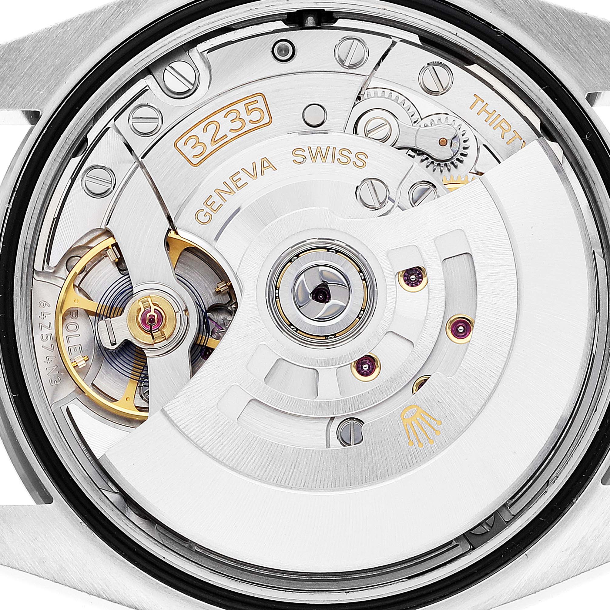 This image shows the movement mechanism of a Rolex Datejust 126234 Men's Stainless Steel Grey Dial 126234 Men's Stainless Steel Grey Dial watch from a close-up, rear angle.