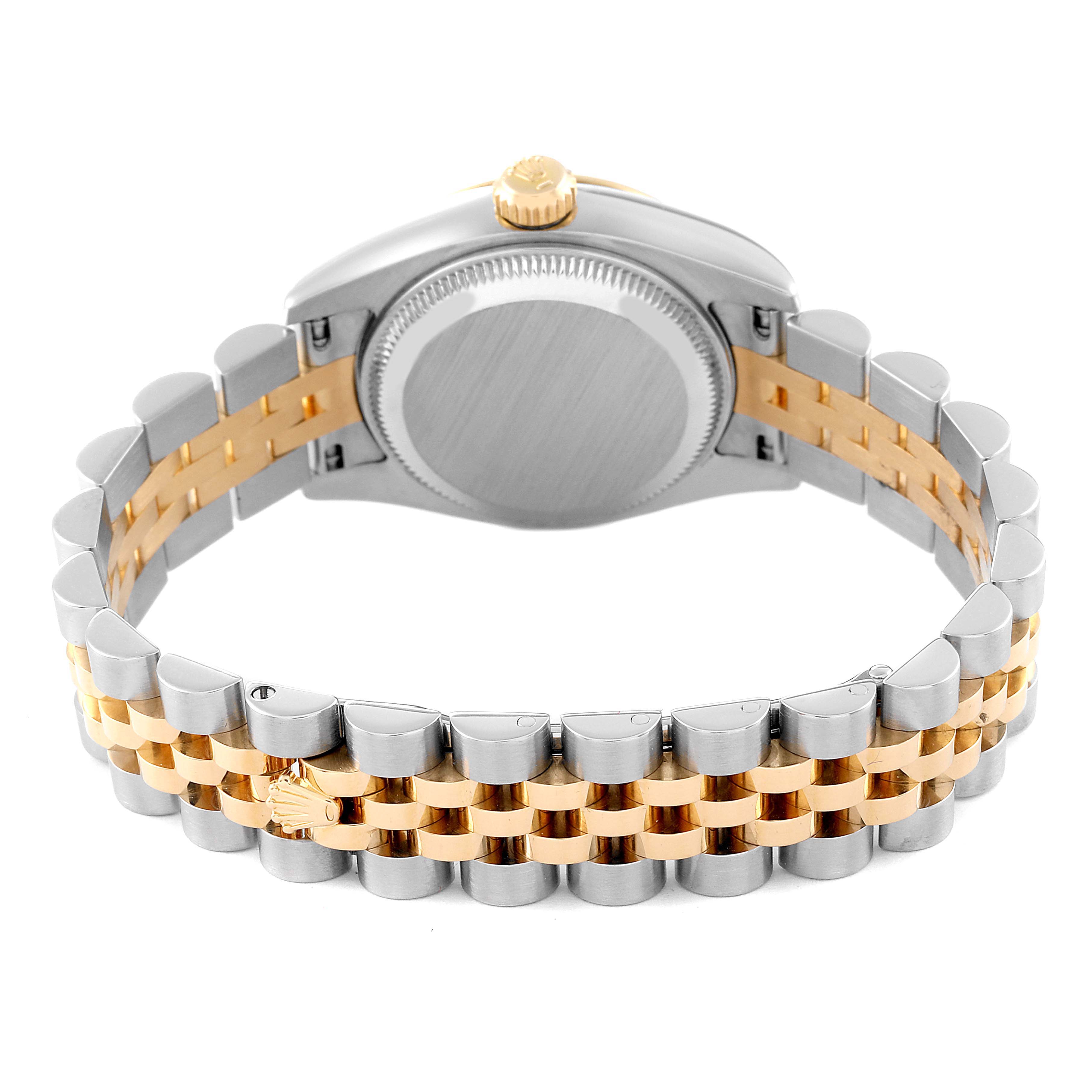 This image shows the back view of the Rolex Datejust 179173 Women's Steel and Gold (two tone) Champagne Dial 179173 Women's Steel and Gold (two tone) Champagne Dial watch, focusing on the case back and the two-tone bracelet.