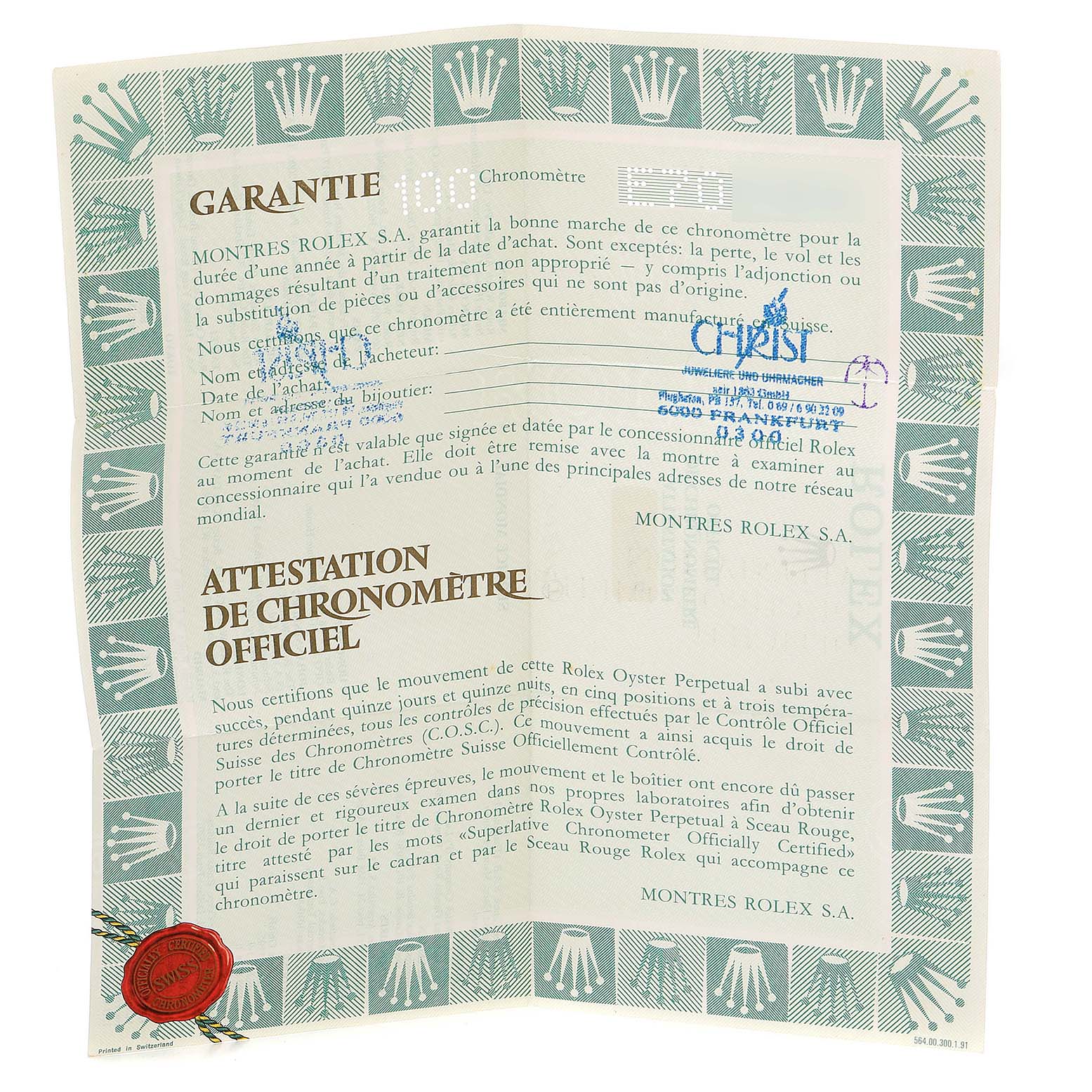 This is a Rolex Datejust 16233 Men's Steel and Gold (two tone) Black Dial 16233 Men's Steel and Gold (two tone) Black Dial warranty certificate shown flat and fully open.