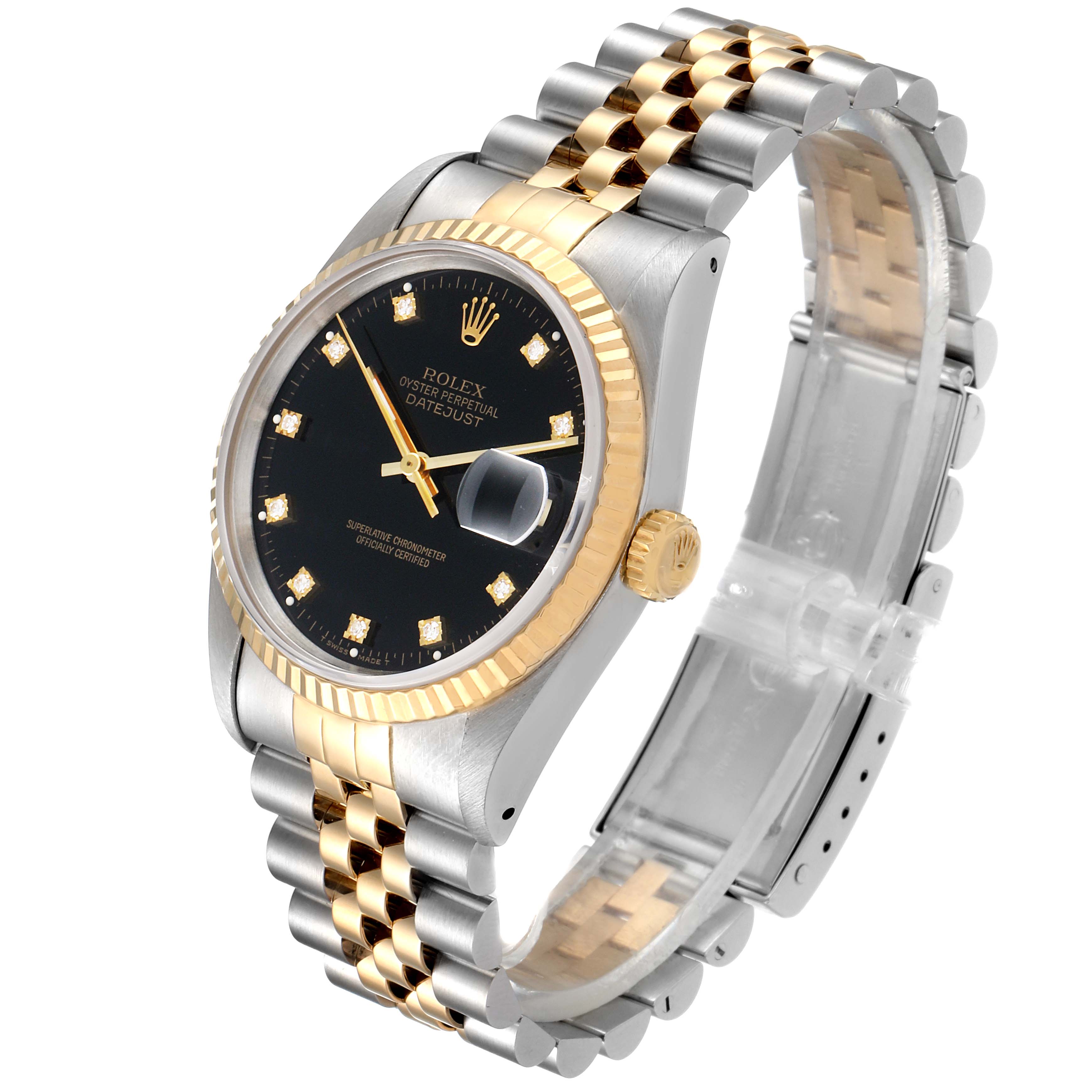 This image shows a Rolex Datejust 16233 Men's Steel and Gold (two tone) Black Dial 16233 Men's Steel and Gold (two tone) Black Dial watch at an angle highlighting its face, two-tone bracelet, gold fluted bezel, and magnified date window.