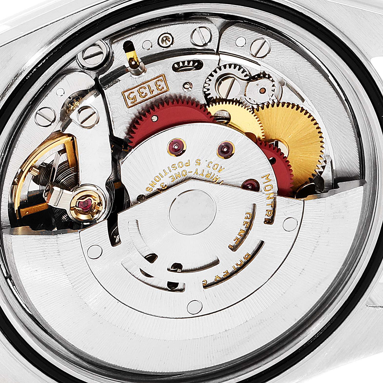 This is a close-up view of the internal mechanism of a Rolex Datejust 16233 Men's Steel and Gold (two tone) Black Dial 16233 Men's Steel and Gold (two tone) Black Dial watch, showing gears and movement parts.