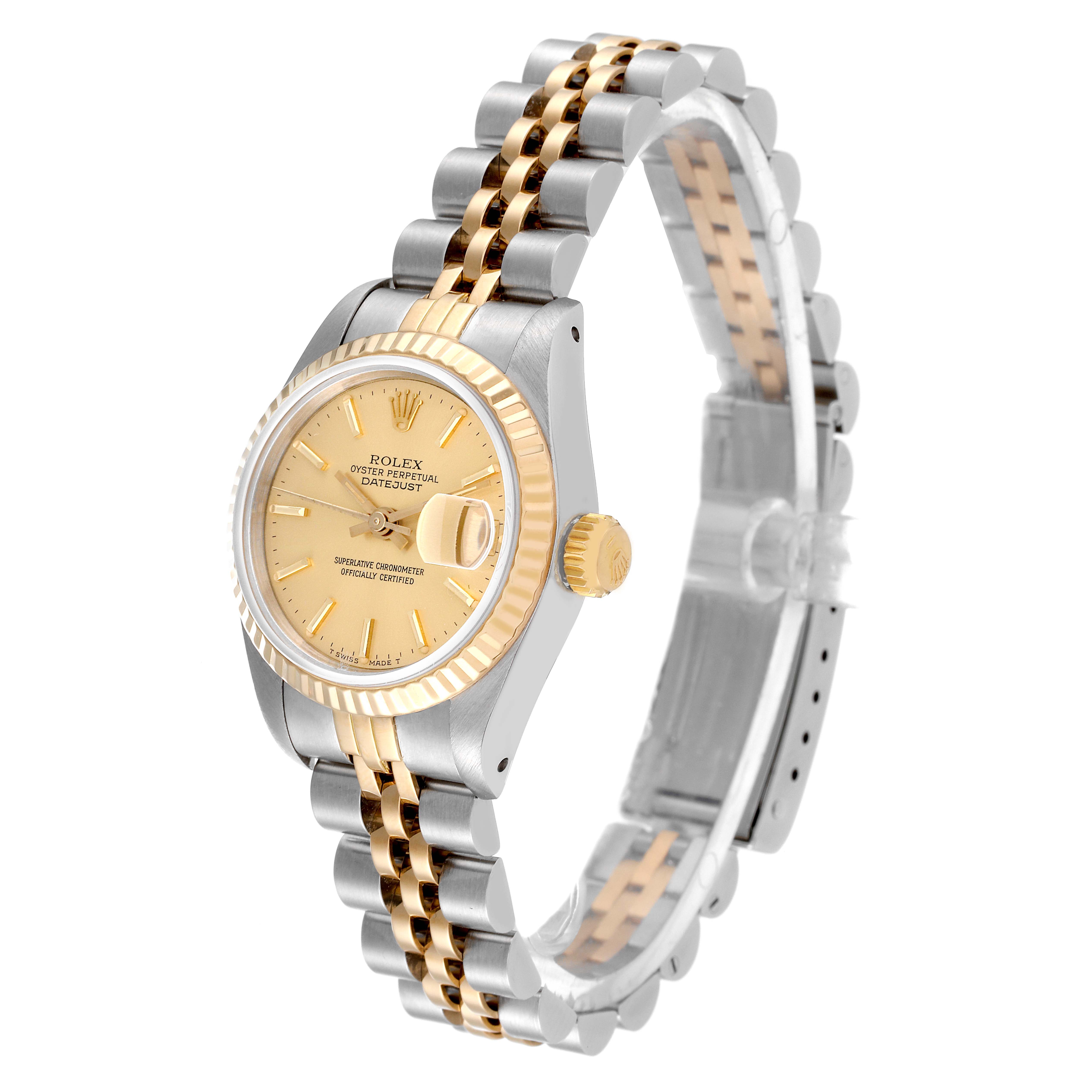 This image shows a Rolex Datejust 69173 Women's Steel and Gold (two tone) Champagne Dial 69173 Women's Steel and Gold (two tone) Champagne Dial watch at an angled view highlighting its gold face, fluted bezel, crown, and two-tone bracelet.