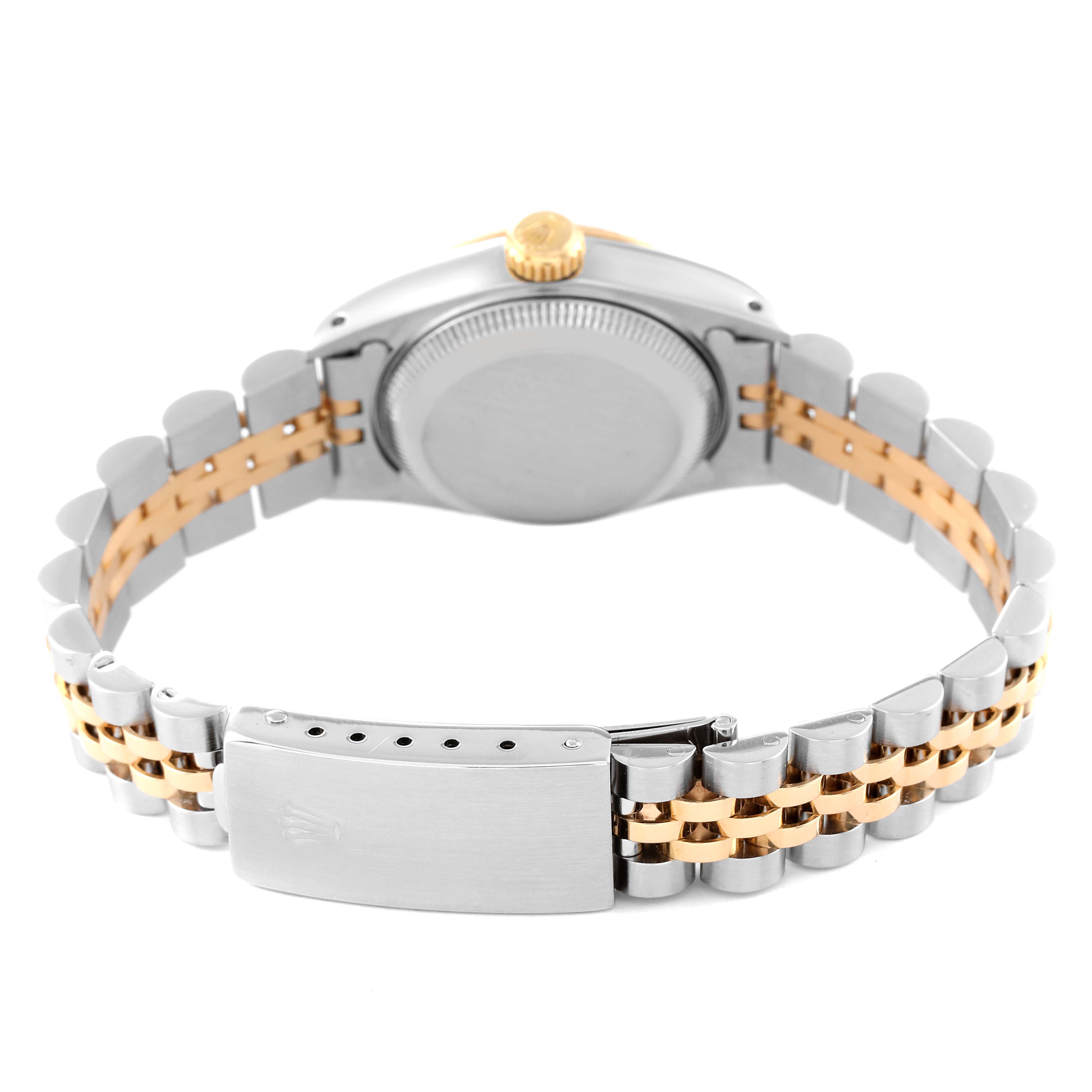 The image shows the back view of the Rolex Datejust 69173 Women's Steel and Gold (two tone) Champagne Dial 69173 Women's Steel and Gold (two tone) Champagne Dial watch, focusing on the case back and the two-tone metal bracelet.