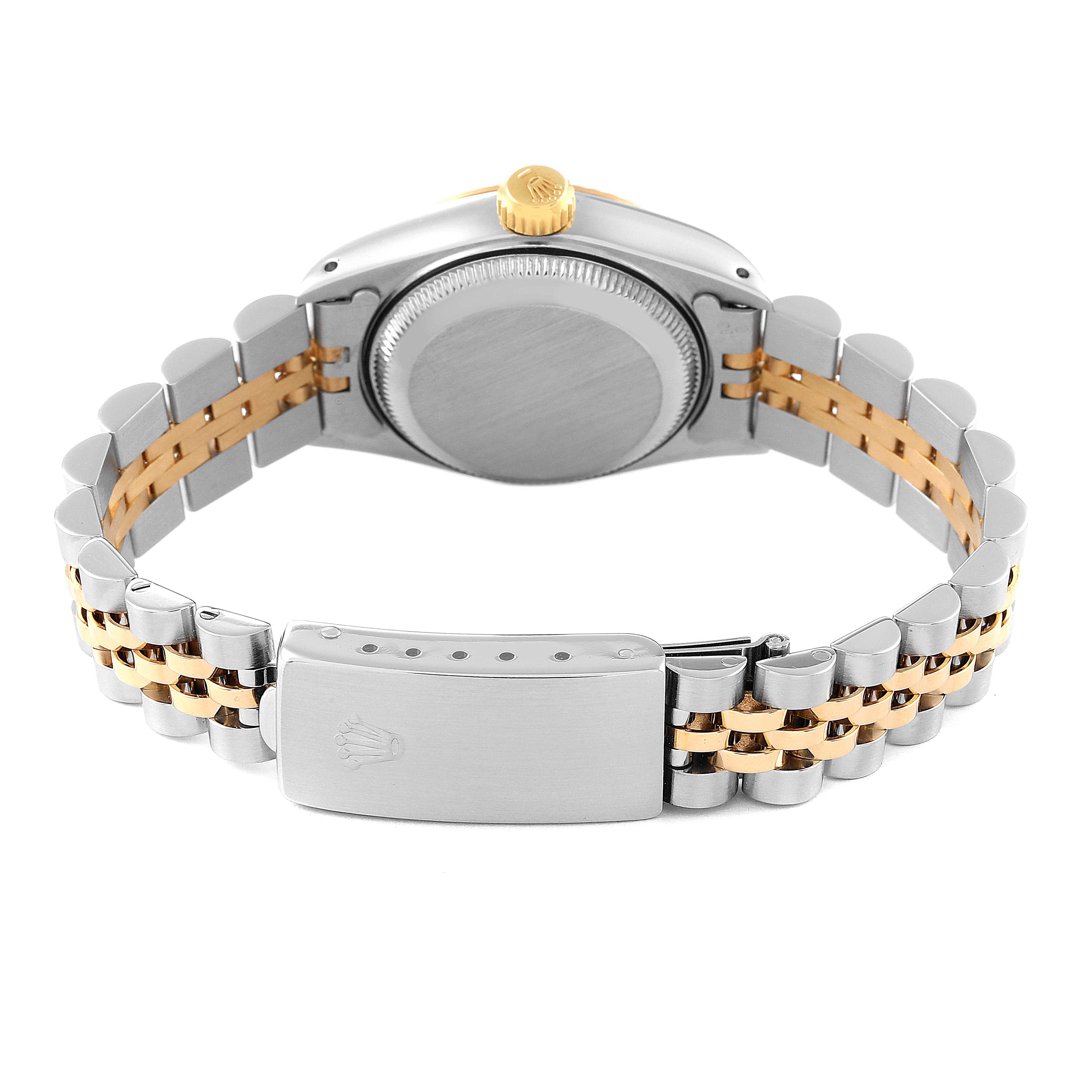 This Rolex Datejust 69173 Women's Steel and Gold (two tone) Champagne Dial 69173 Women's Steel and Gold (two tone) Champagne Dial watch is shown from the rear, highlighting the case back, bracelet, and clasp.