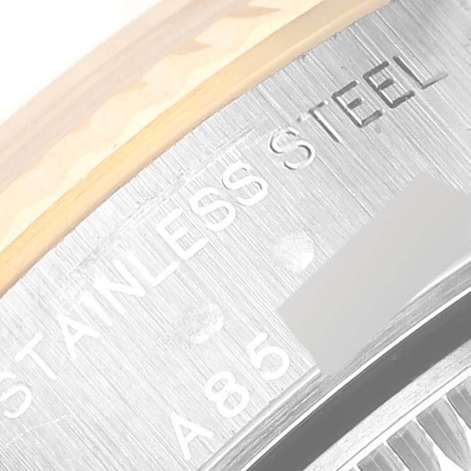 The image shows a close-up of the stainless steel casing with serial markings on a Rolex Datejust 79173G Women's Steel and Gold (two tone) Champagne Dial 79173G Women's Steel and Gold (two tone) Champagne Dial model.