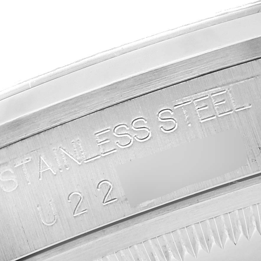 This image shows a close-up angle of the Rolex Explorer 14270 Men's Stainless Steel Black Dial 14270 Men's Stainless Steel Black Dial's stainless steel case with engraving details visible.