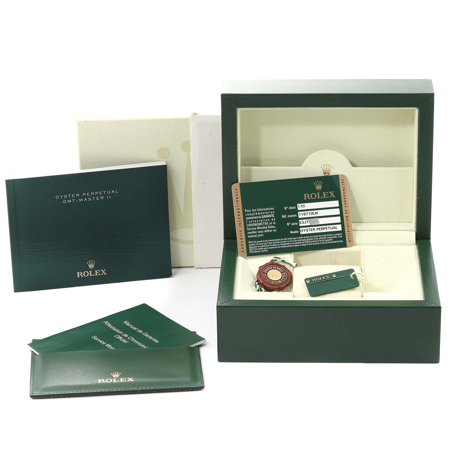 The image showcases the packaging and accessories of a Rolex GMT-Master 116710 Men
s Stainless Steel Black Dial 116710 Men
s Stainless Steel Black Dial, including the box, manuals, tags, and warranty card.