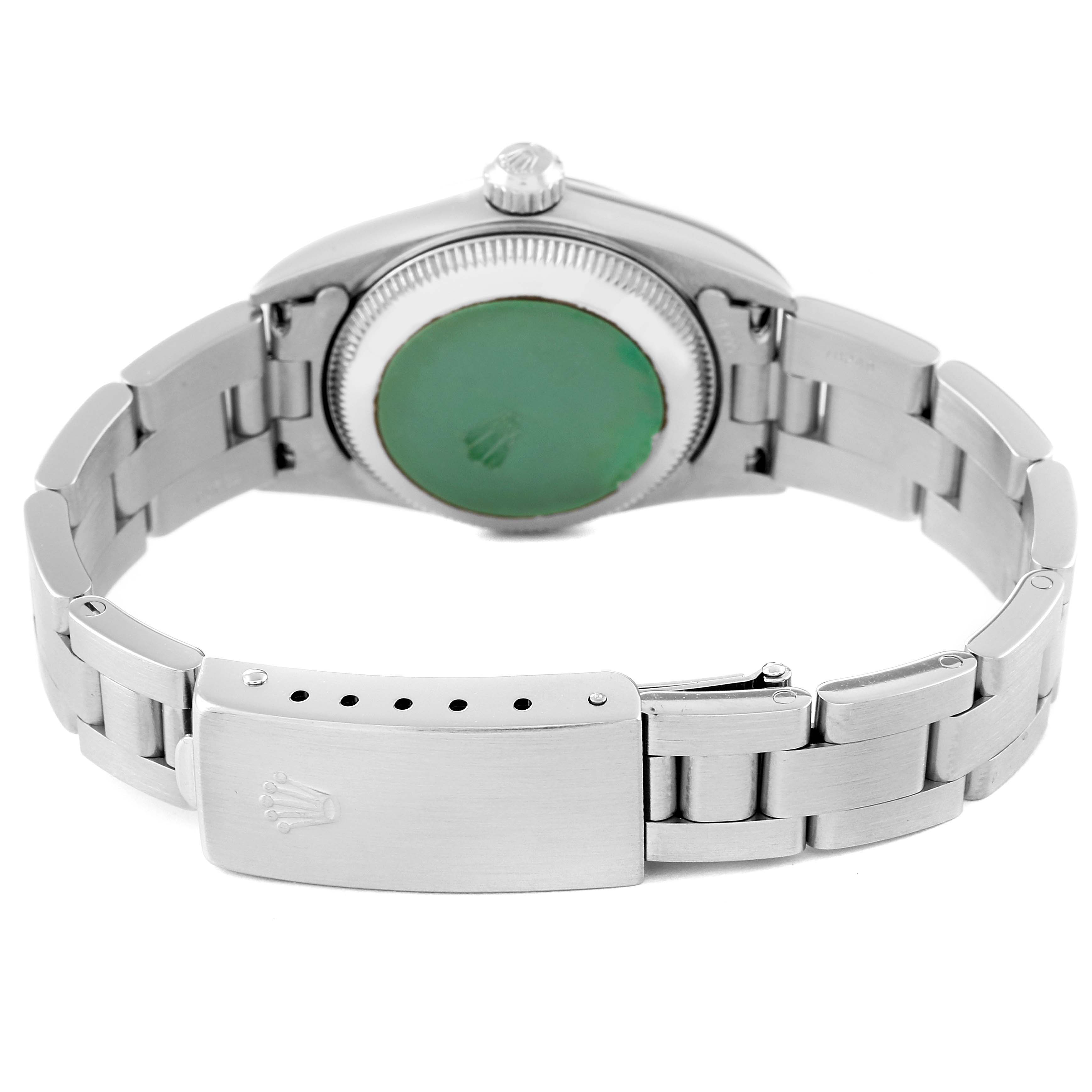 The image shows the back view of a Rolex Oyster Perpetual 76080 Women's Stainless Steel Black Dial 76080 Women's Stainless Steel Black Dial watch, highlighting the bracelet and clasp.