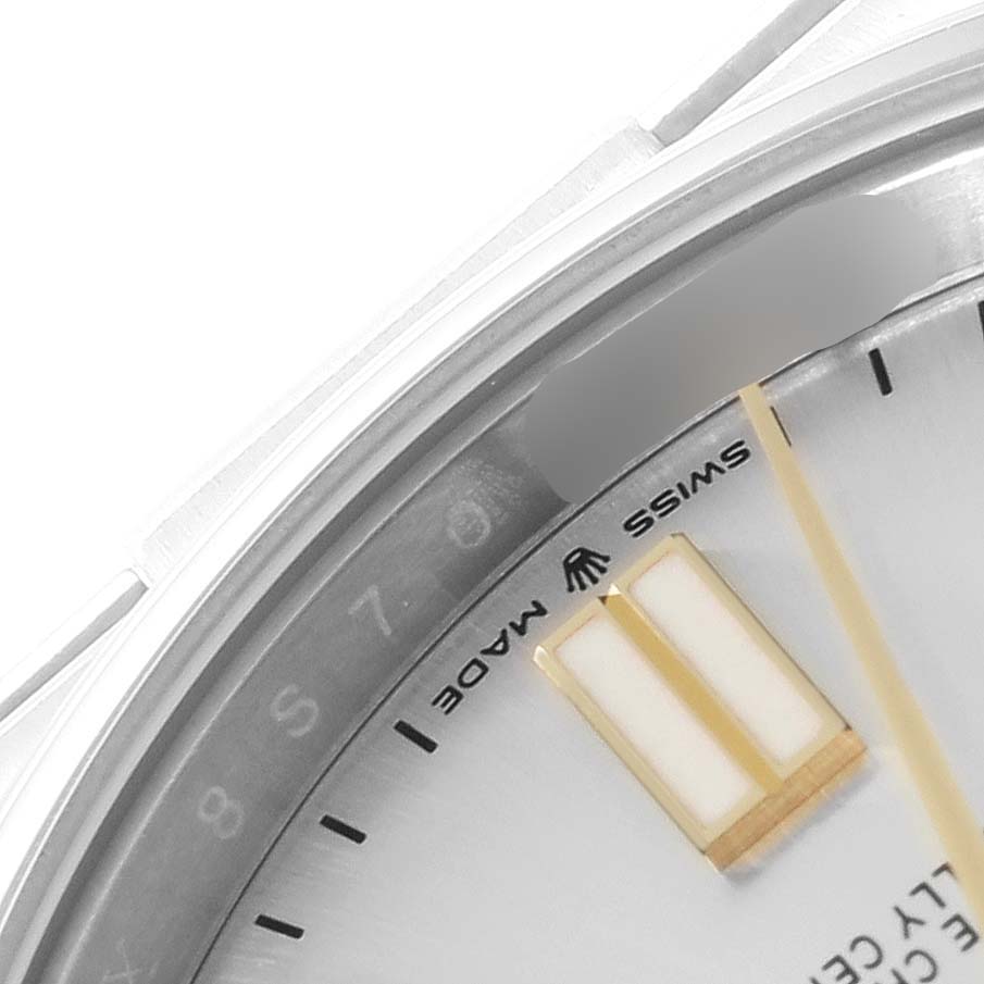 This image shows a close-up of the dial and part of the bezel of the Rolex Oyster Perpetual 124300 Men's Stainless Steel Silver Dial 124300 Men's Stainless Steel Silver Dial watch.