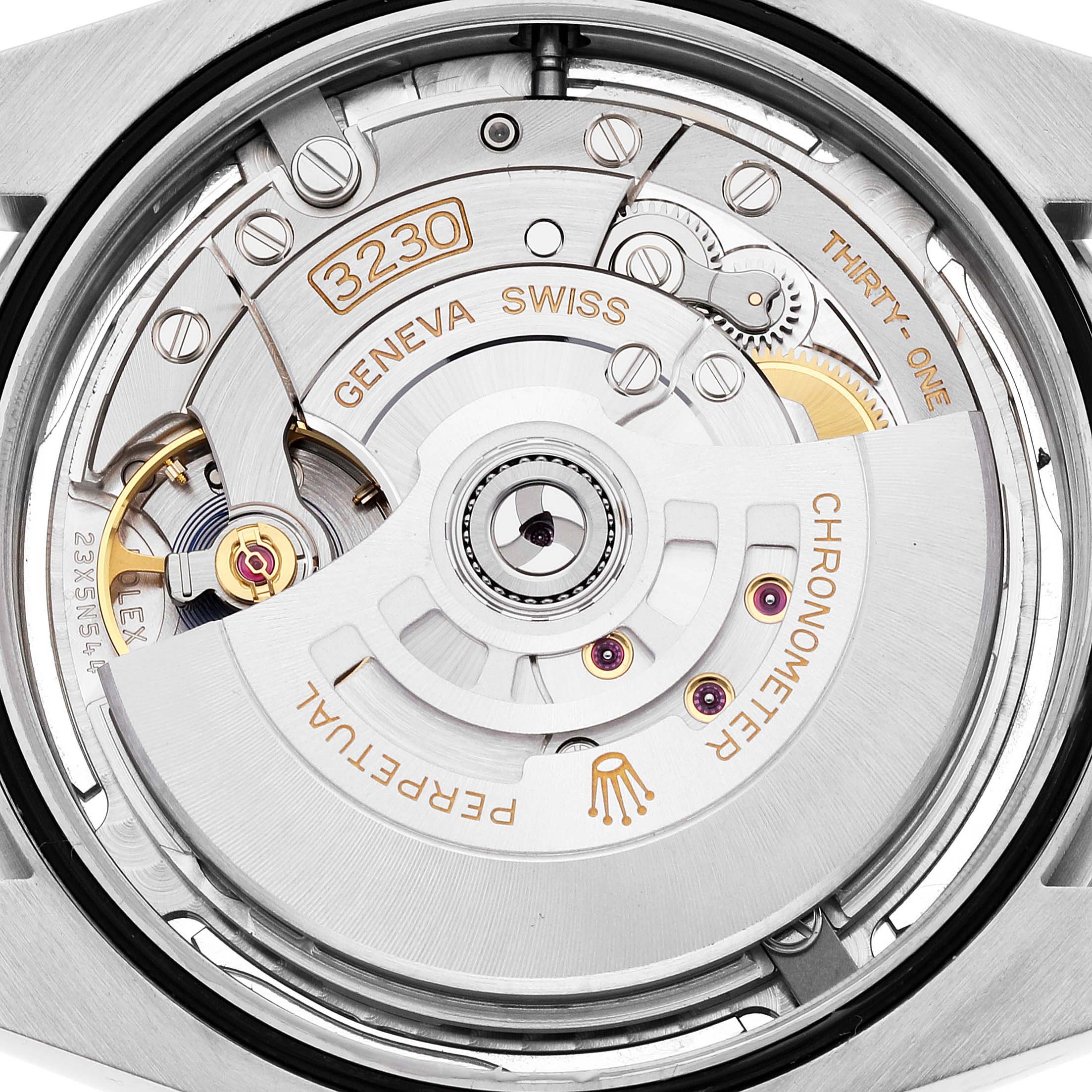 The image shows the back view of a Rolex Oyster Perpetual 124300 Men's Stainless Steel Silver Dial 124300 Men's Stainless Steel Silver Dial watch, highlighting its intricate internal mechanisms.
