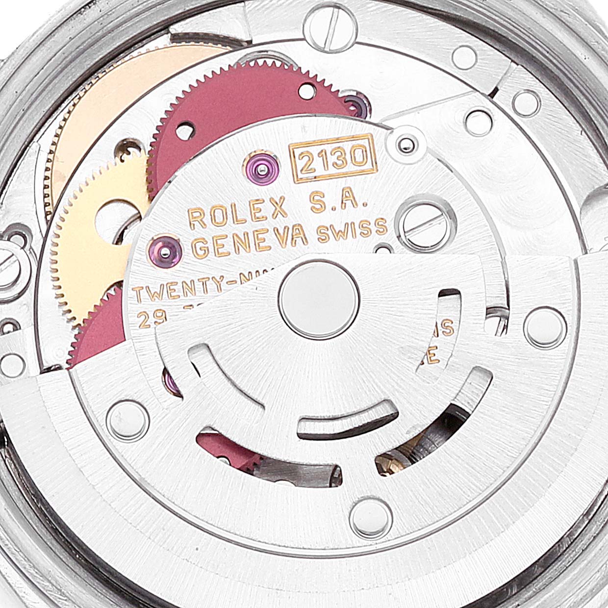 This image shows a close-up view of the movement mechanism inside a Rolex Oyster Perpetual 67180 Women's Stainless Steel Blue Dial 67180 Women's Stainless Steel Blue Dial watch.
