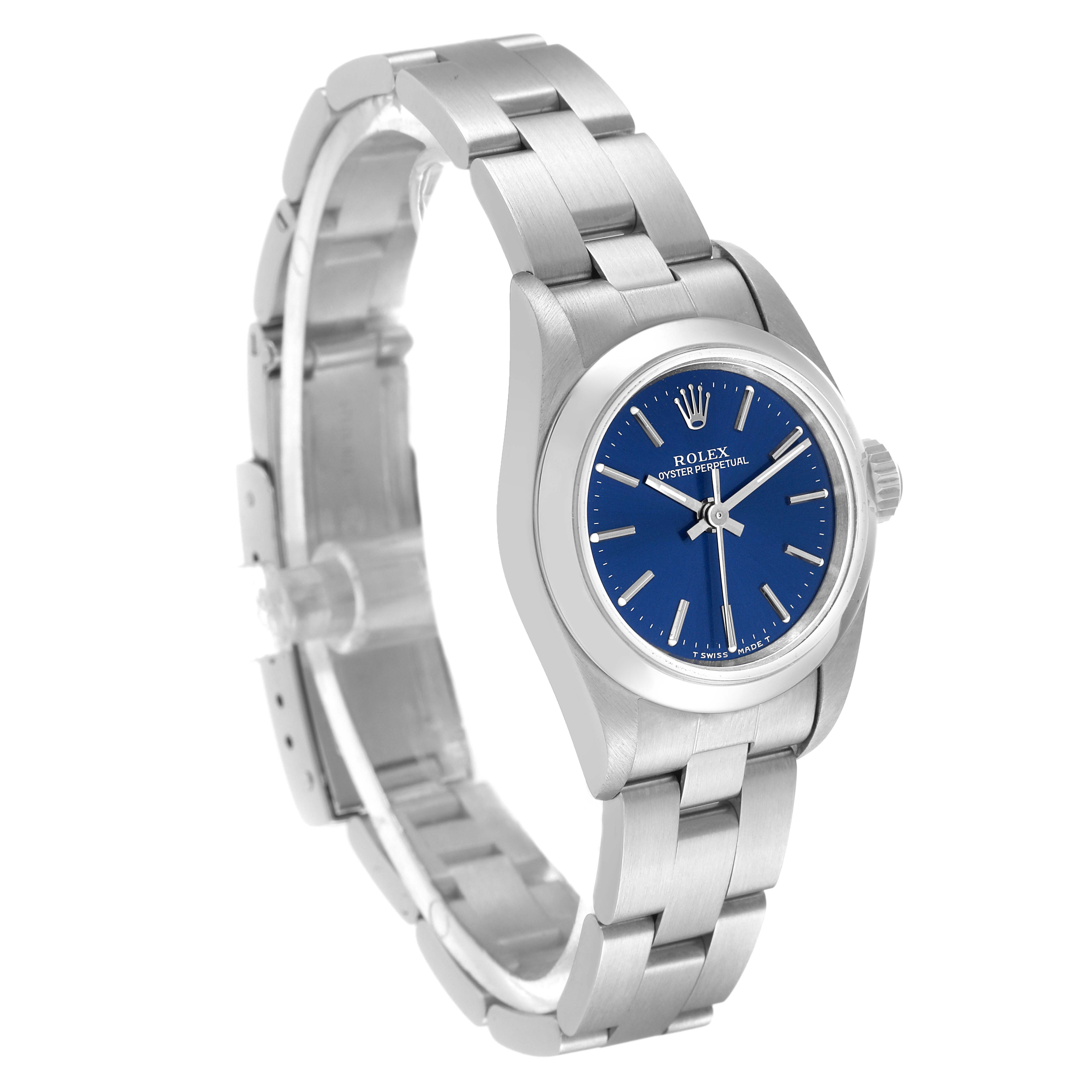 The Rolex Oyster Perpetual 67180 Women's Stainless Steel Blue Dial 67180 Women's Stainless Steel Blue Dial watch is shown from a three-quarter angle, displaying the bracelet, case, and blue dial.