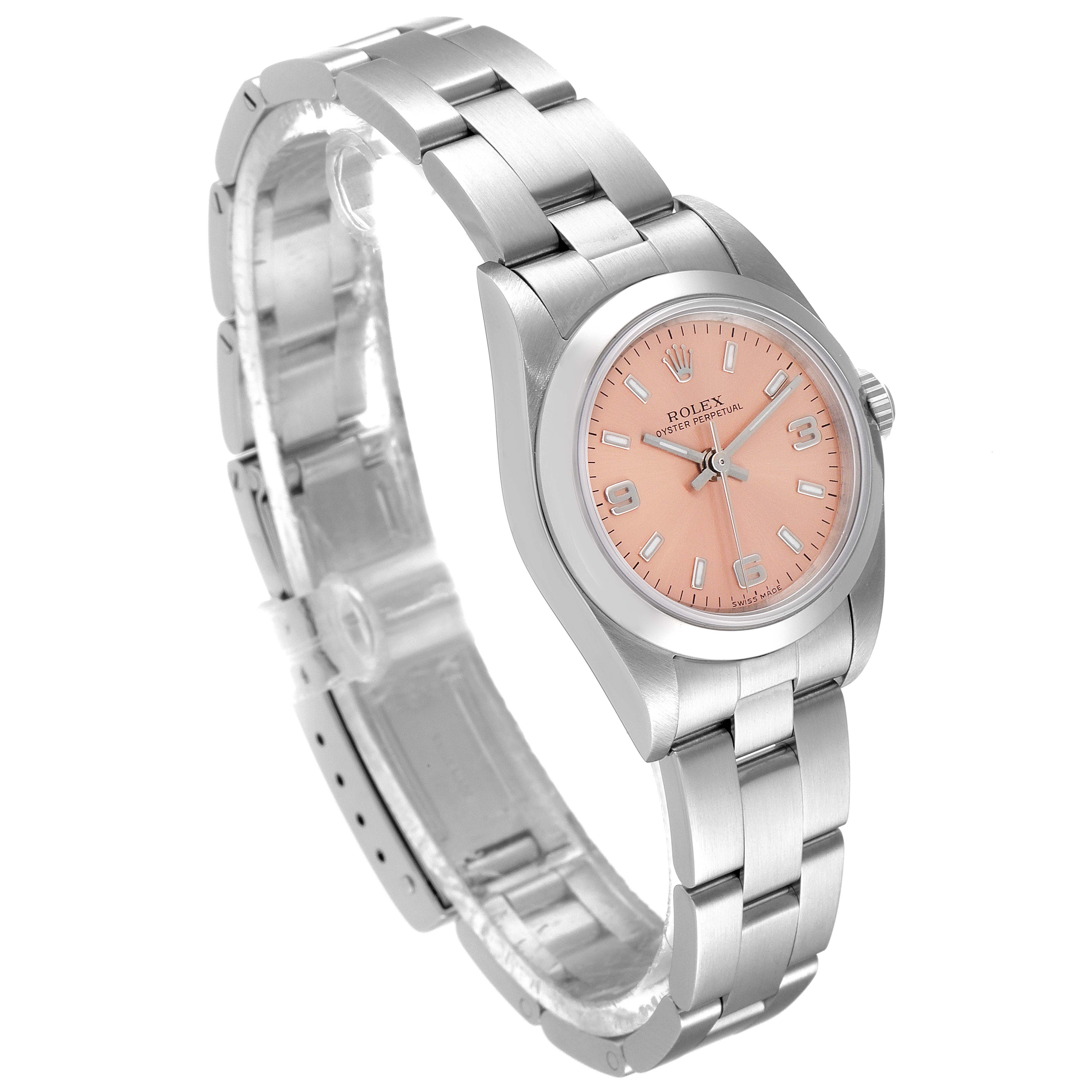 The image shows a Rolex Oyster Perpetual 76080 Women
s Stainless Steel Pink Dial 76080 Women
s Stainless Steel Pink Dial watch at a side angle, showcasing its pink dial, stainless steel case, and bracelet.