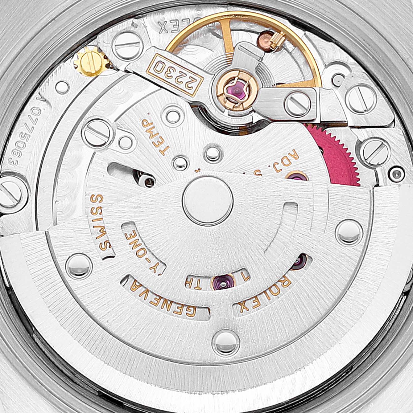 The image shows a close-up view of the movement mechanism of a Rolex Oyster Perpetual 76080 Women
s Stainless Steel Pink Dial 76080 Women
s Stainless Steel Pink Dial watch.