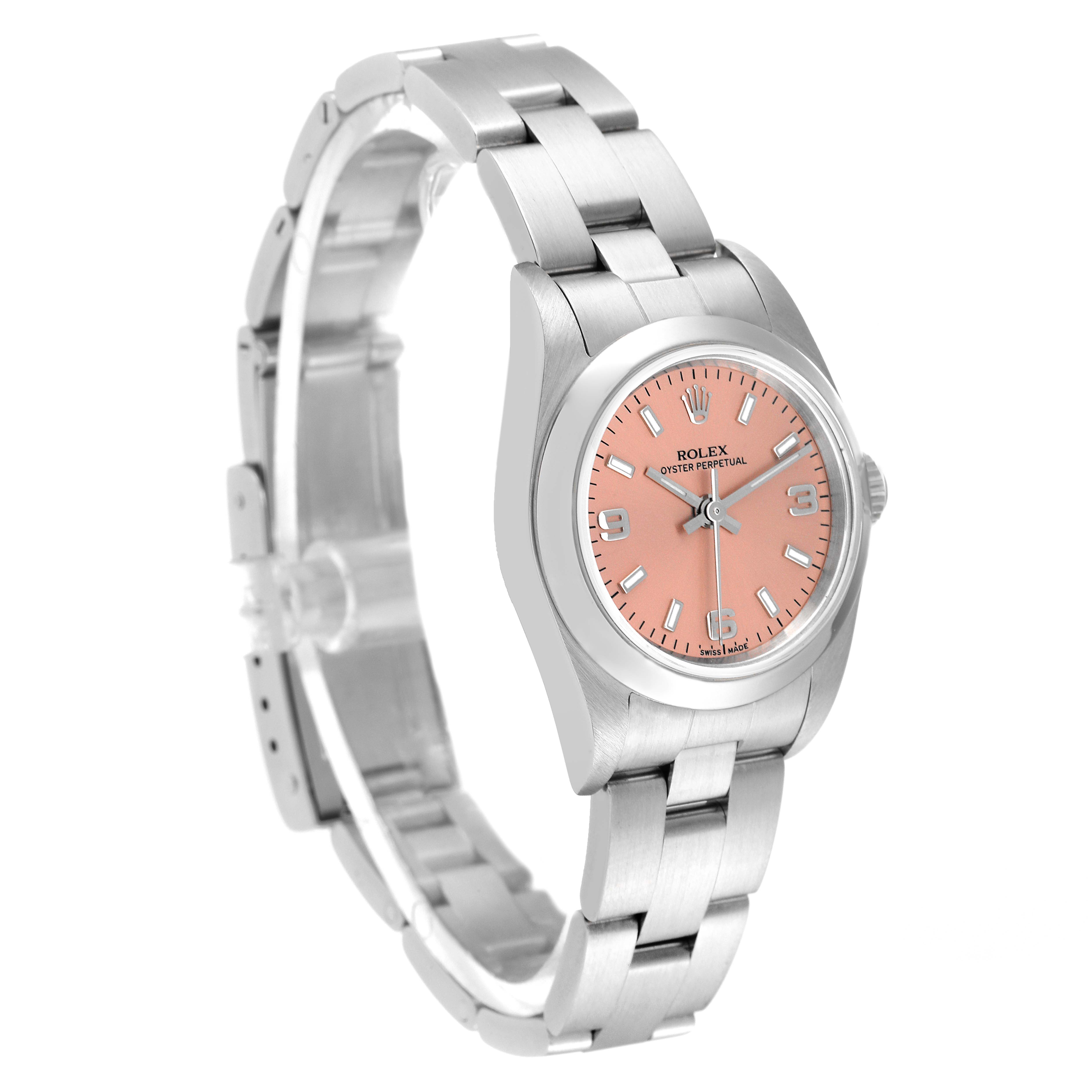 The Rolex Oyster Perpetual 76080 Women
s Stainless Steel Pink Dial 76080 Women
s Stainless Steel Pink Dial watch is shown at a three-quarter angle, highlighting its pink dial and stainless steel bracelet.