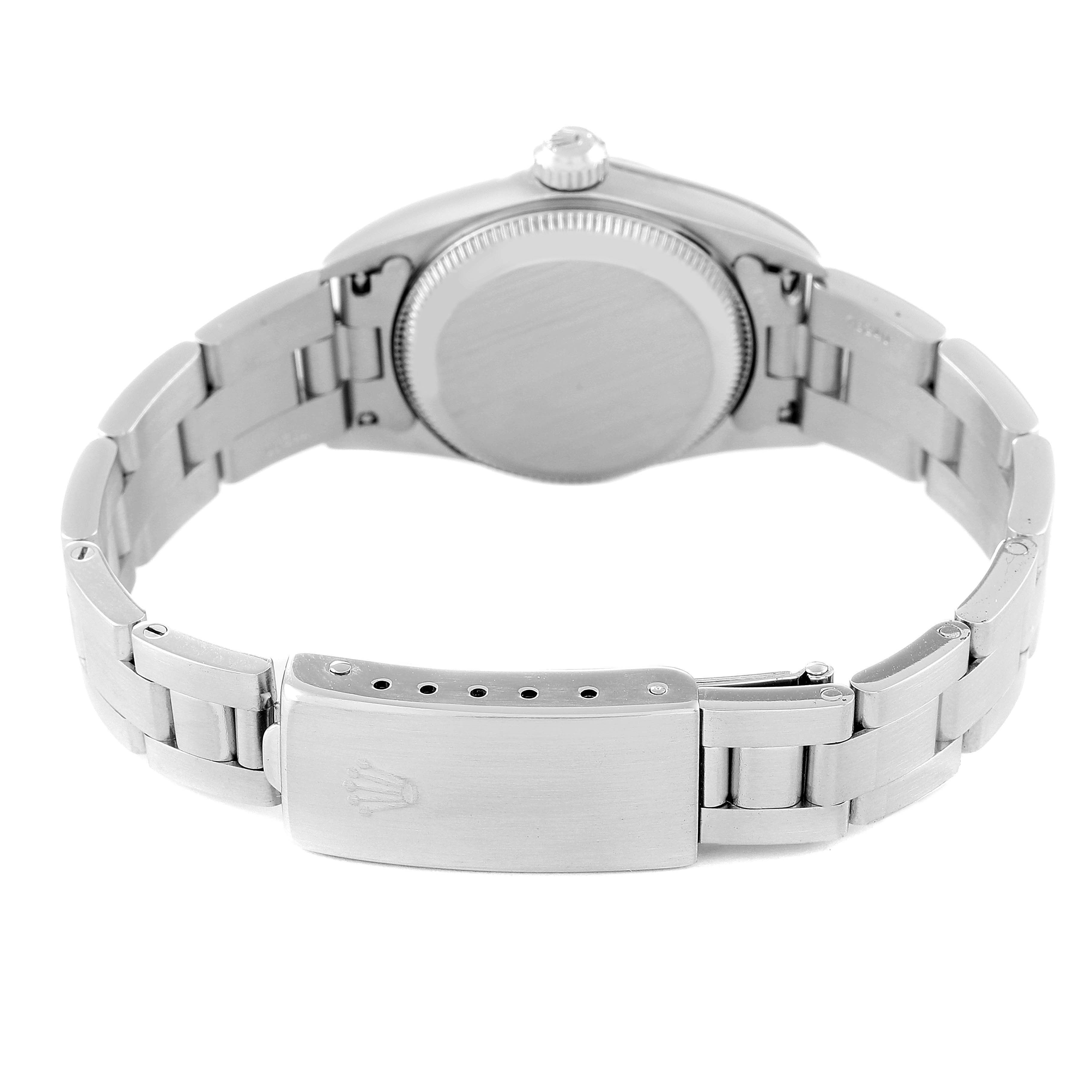 This image shows the back of the Rolex Oyster Perpetual 76080 Women
s Stainless Steel Pink Dial 76080 Women
s Stainless Steel Pink Dial watch, highlighting the case back, bracelet, and clasp.