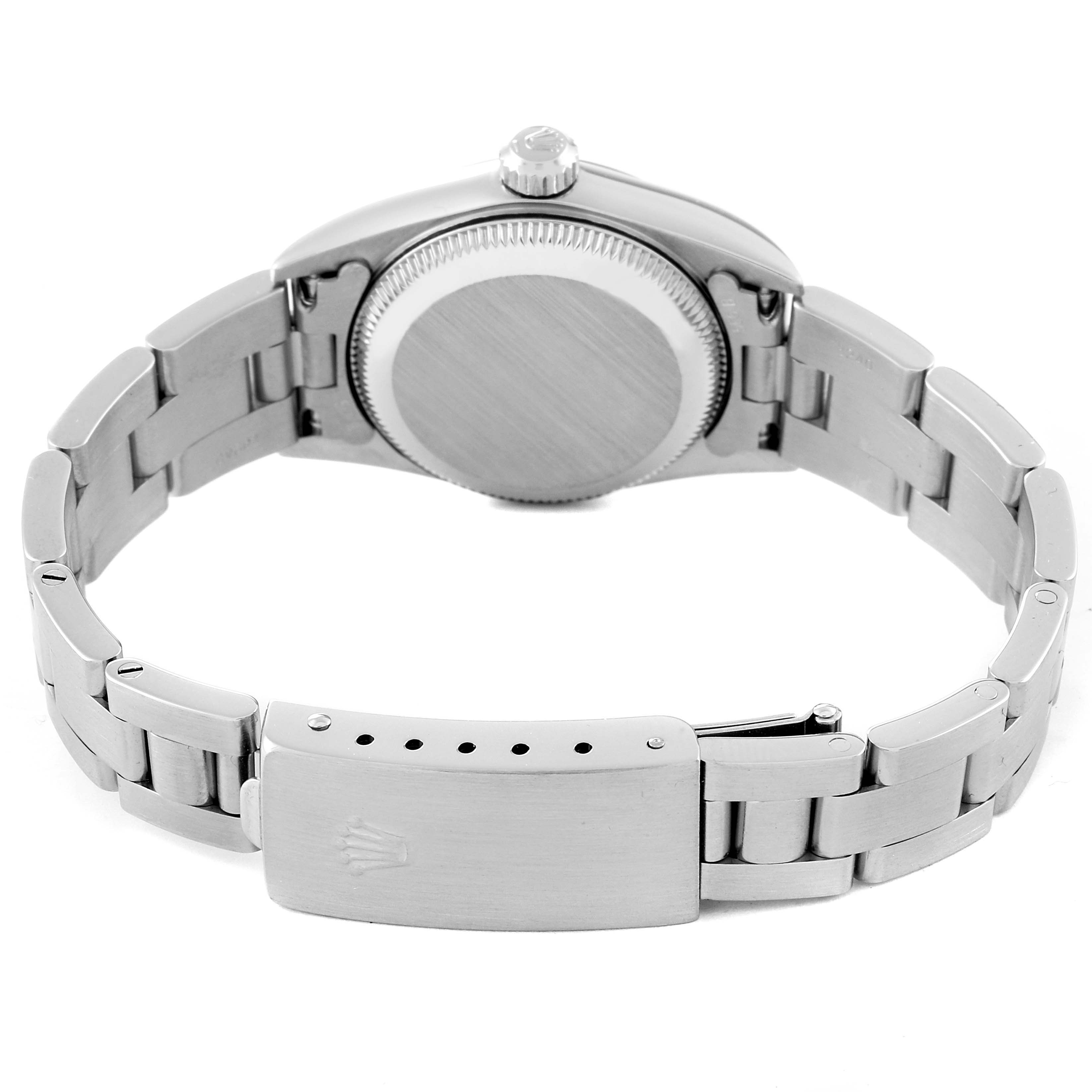 This image shows the back view of a Rolex Oyster Perpetual 76080 Women's Stainless Steel White Dial 76080 Women's Stainless Steel White Dial watch, highlighting the case back and bracelet clasp.