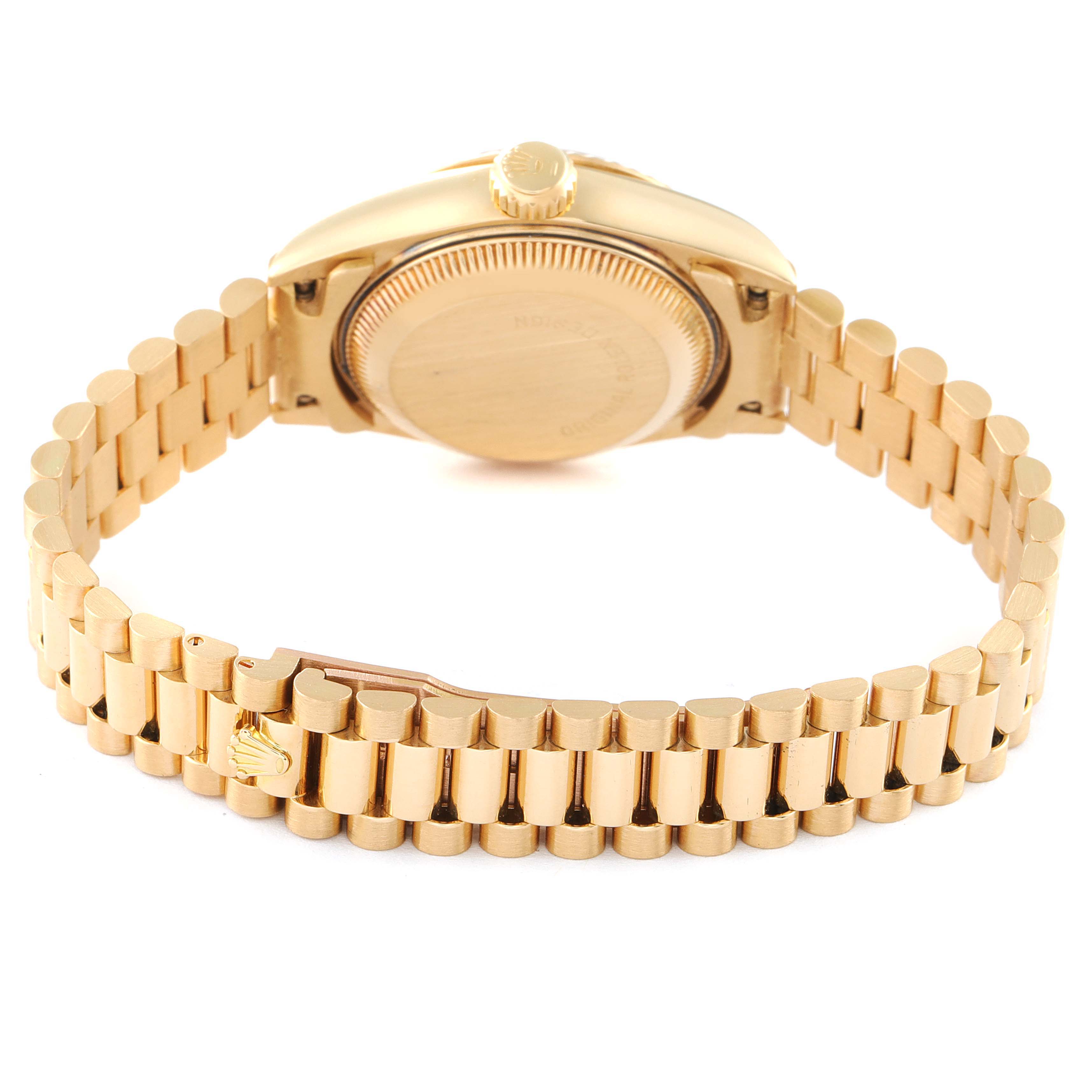 This image shows the back case and bracelet of a Rolex President 69178 Women's Yellow Gold Champagne Dial 69178 Women's Yellow Gold Champagne Dial model watch from a rear angle.