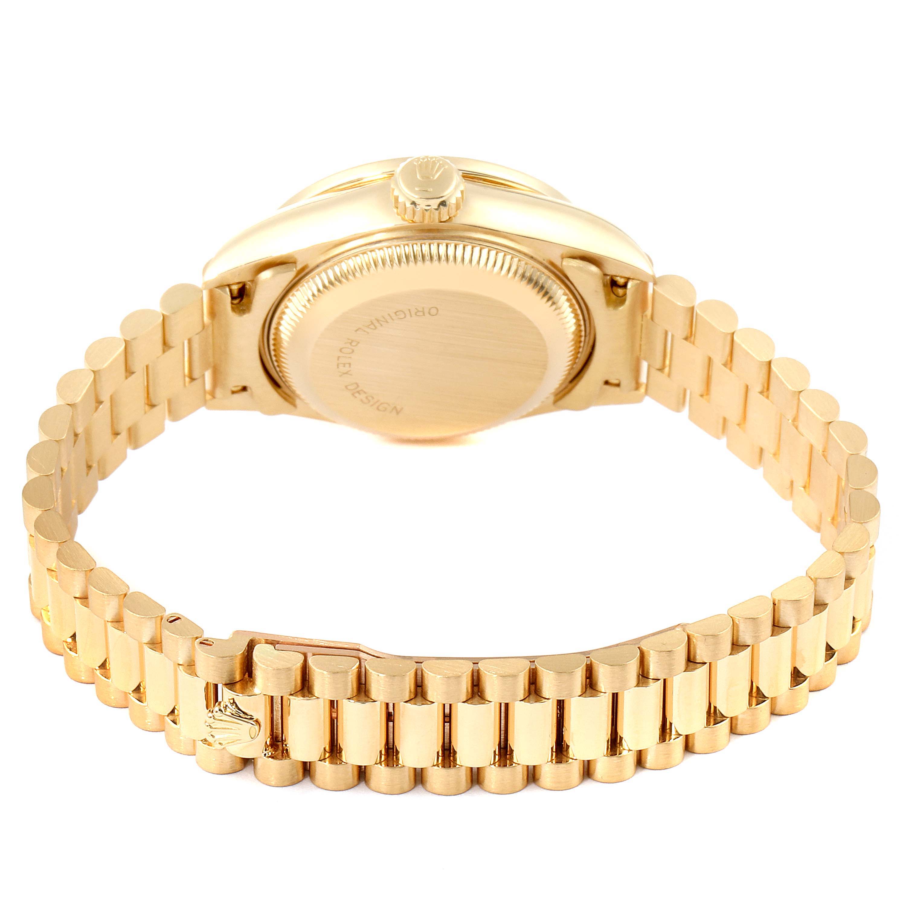 The image shows the back view of a Rolex President 69138 Women
s Yellow Gold Champagne Dial 69138 Women
s Yellow Gold Champagne Dial model watch, highlighting the case back and gold bracelet.