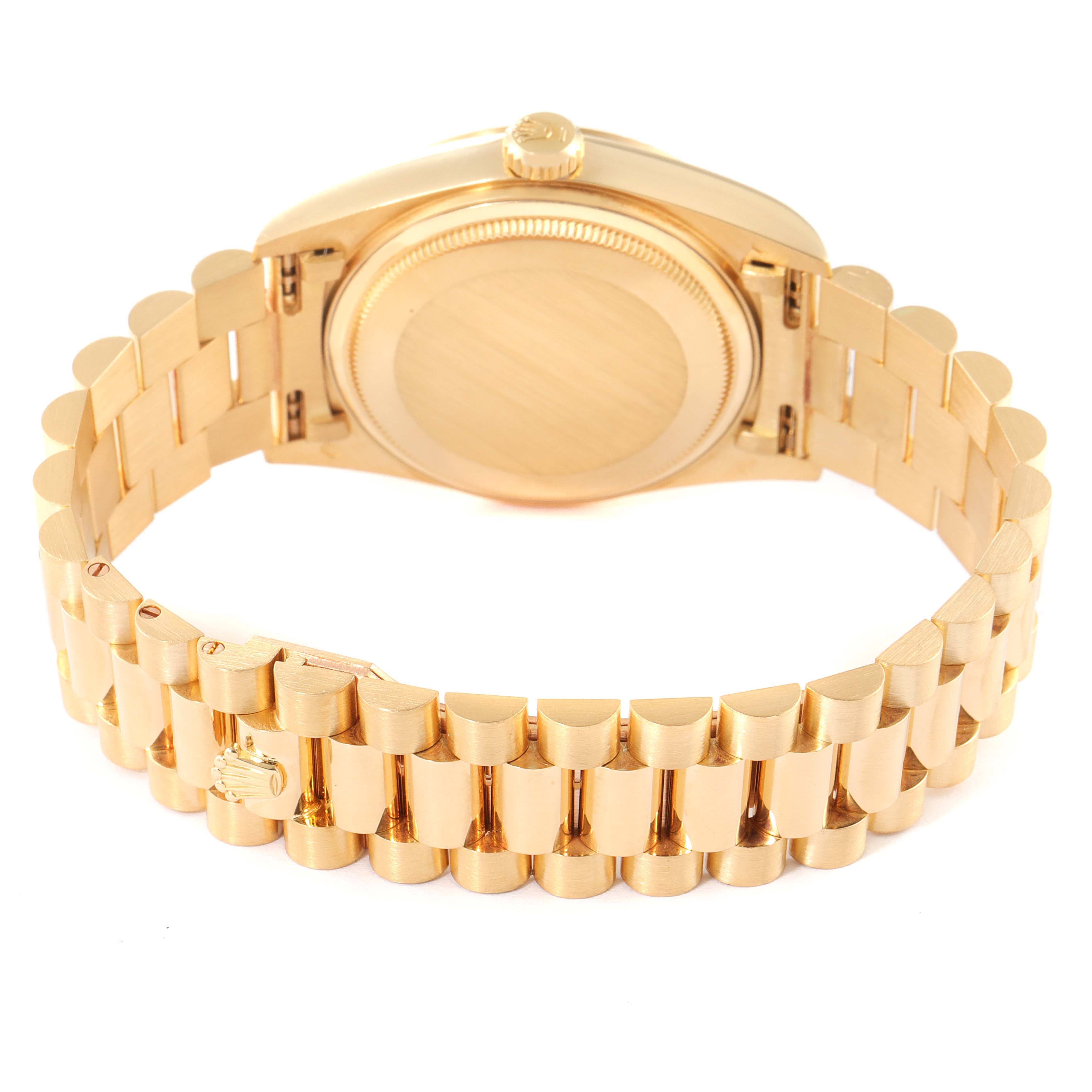 This image shows the back and bracelet of a Rolex President 18038 Men's Yellow Gold Champagne Dial 18038 Men's Yellow Gold Champagne Dial model watch.