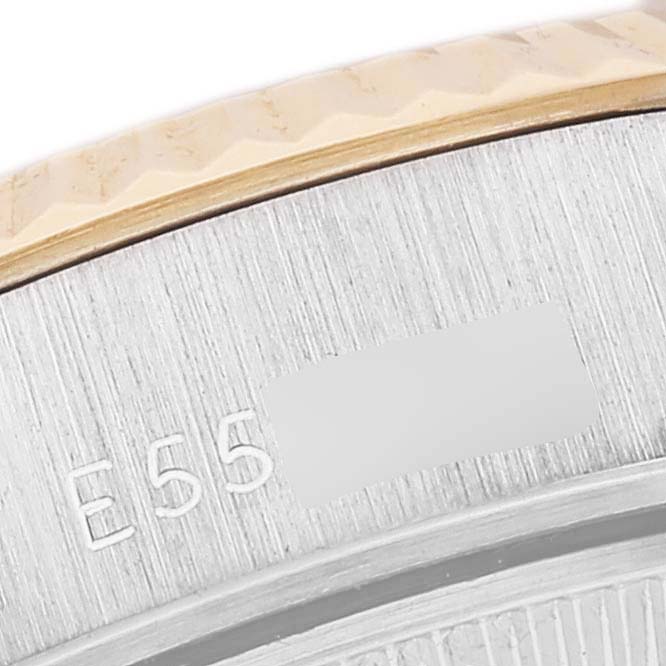 This image shows a close-up view of the side and bezel of a Rolex President 69179G Women
s White Gold Champagne Dial 69179G Women
s White Gold Champagne Dial watch, highlighting its detailed brushed and polished finish.