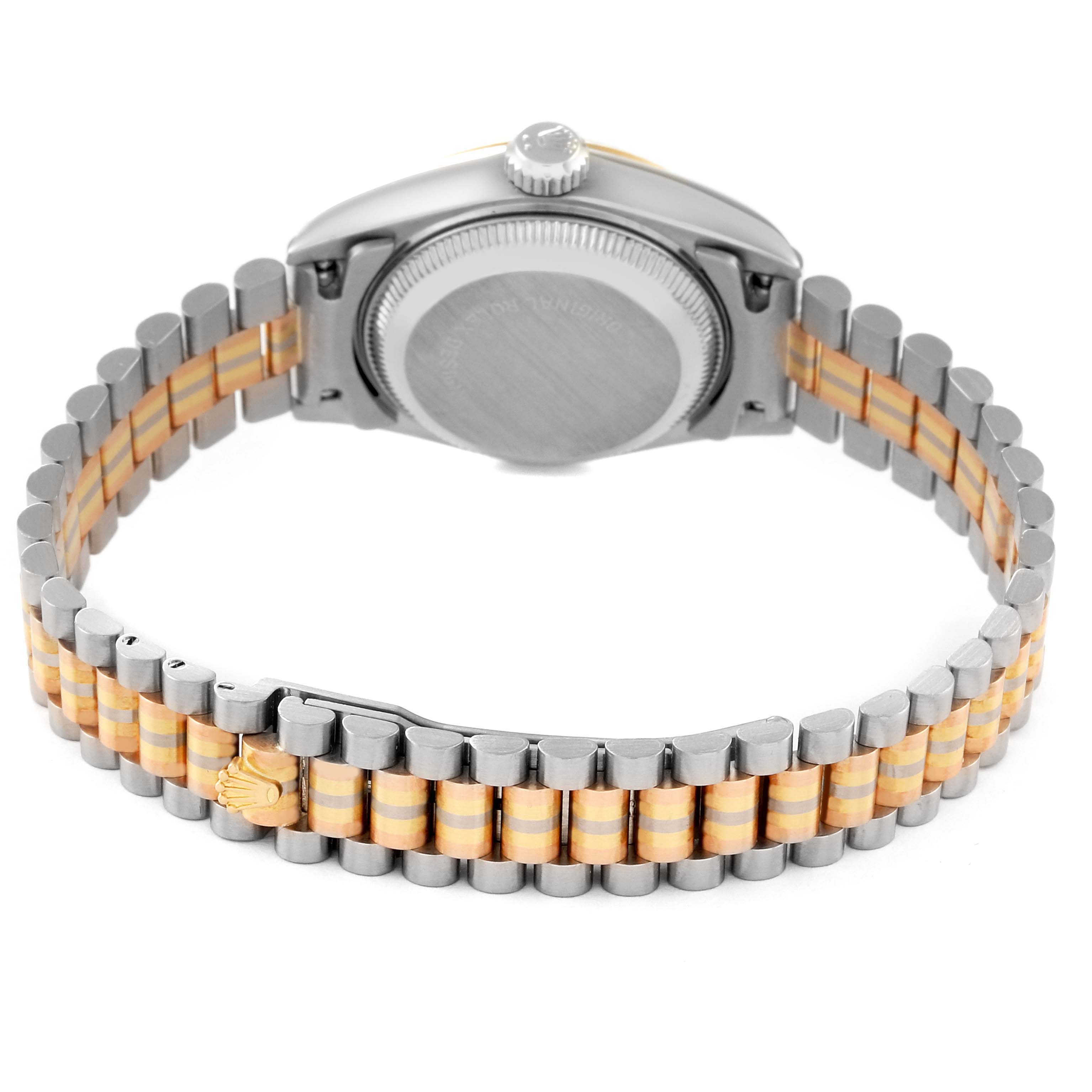 The image shows the back of a Rolex President 69179G Women
s White Gold Champagne Dial 69179G Women
s White Gold Champagne Dial watch, including the case back and the two-tone bracelet.