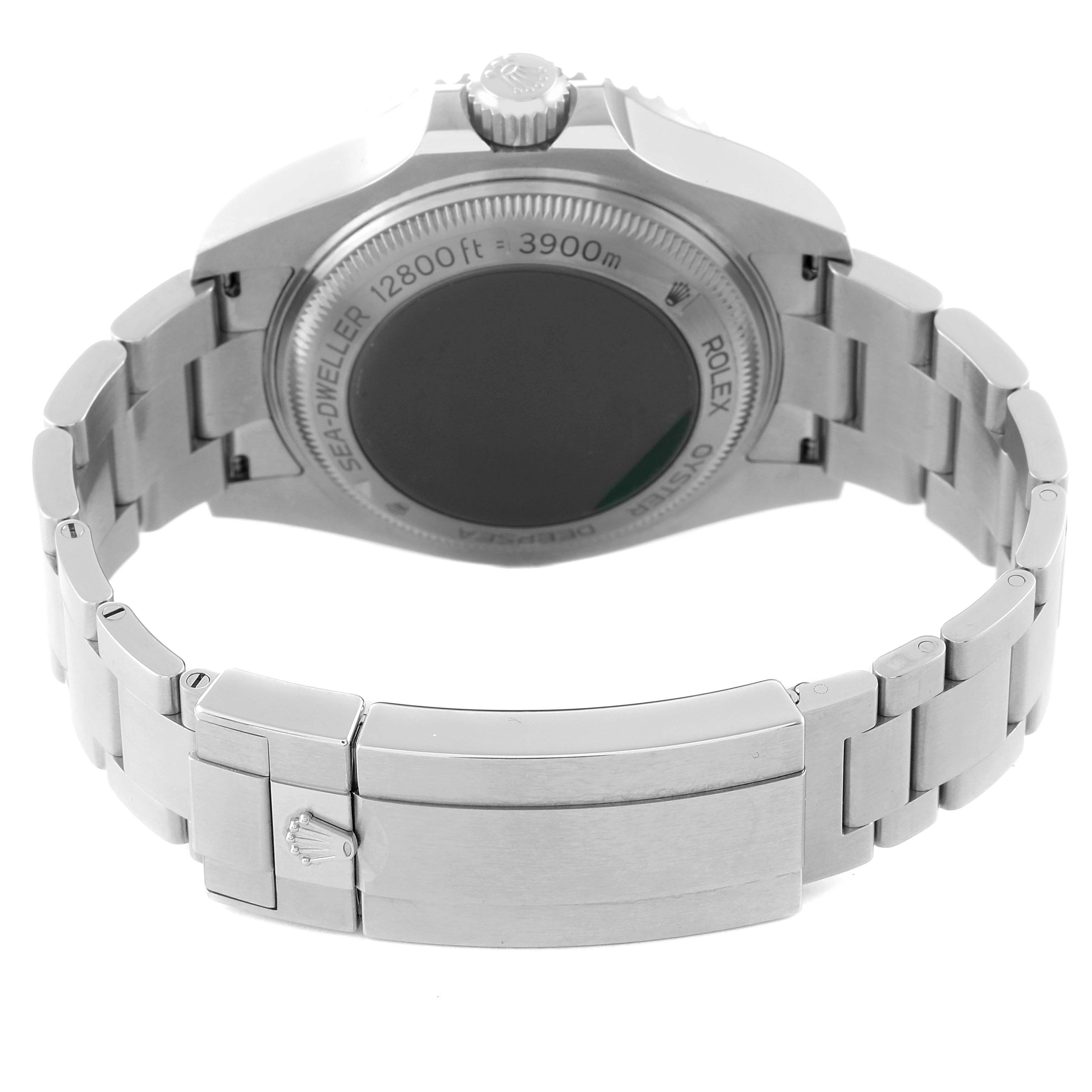 The image shows the back side of the Rolex Sea-Dweller 126660 Men
s Stainless Steel Blue Dial 126660 Men
s Stainless Steel Blue Dial watch, highlighting the case back, bracelet, and clasp.