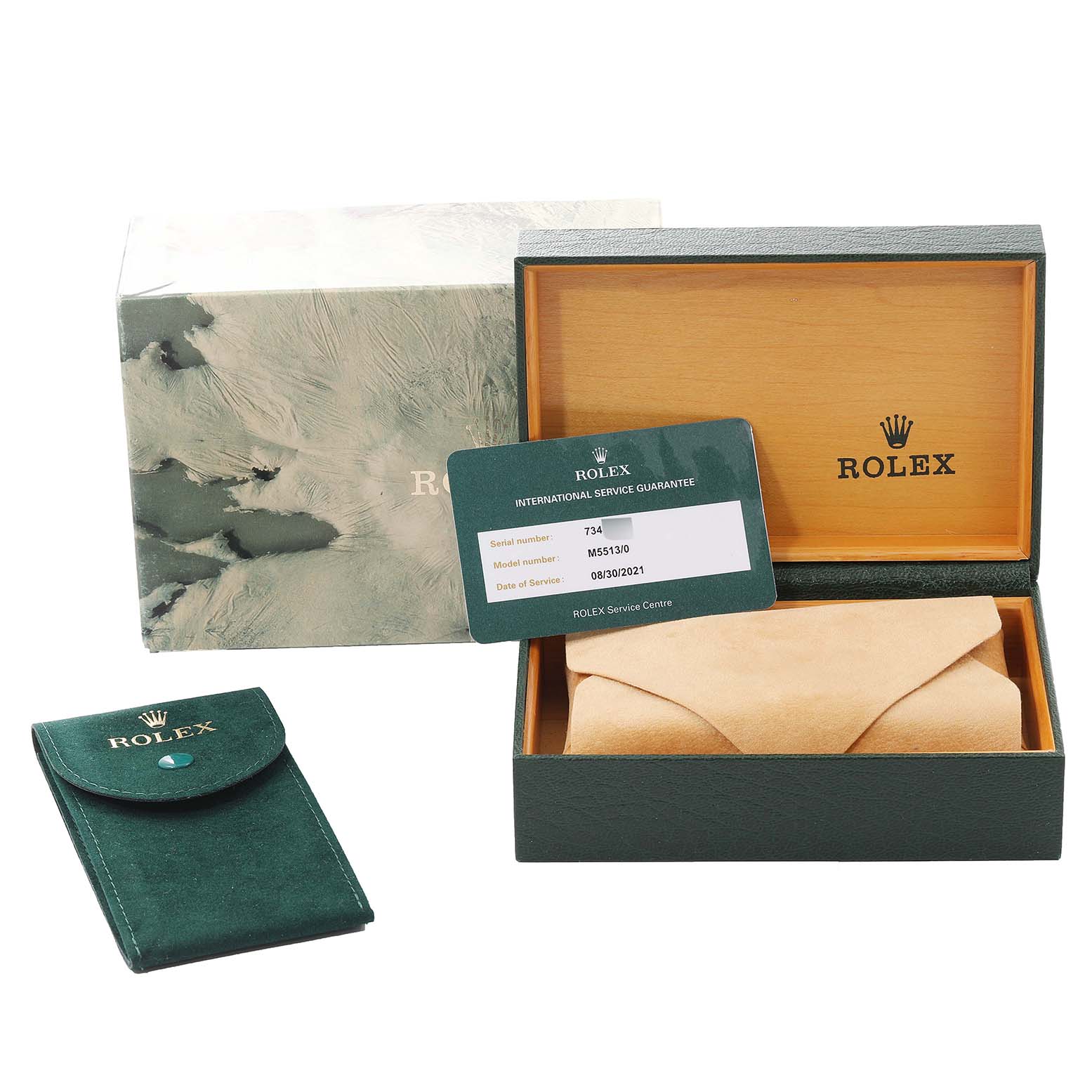 This image shows the packaging of a Rolex Submariner 5513 Men's Stainless Steel Black Dial 5513 Men's Stainless Steel Black Dial, including the inner wooden box, outer box, warranty card, and carrying pouch.